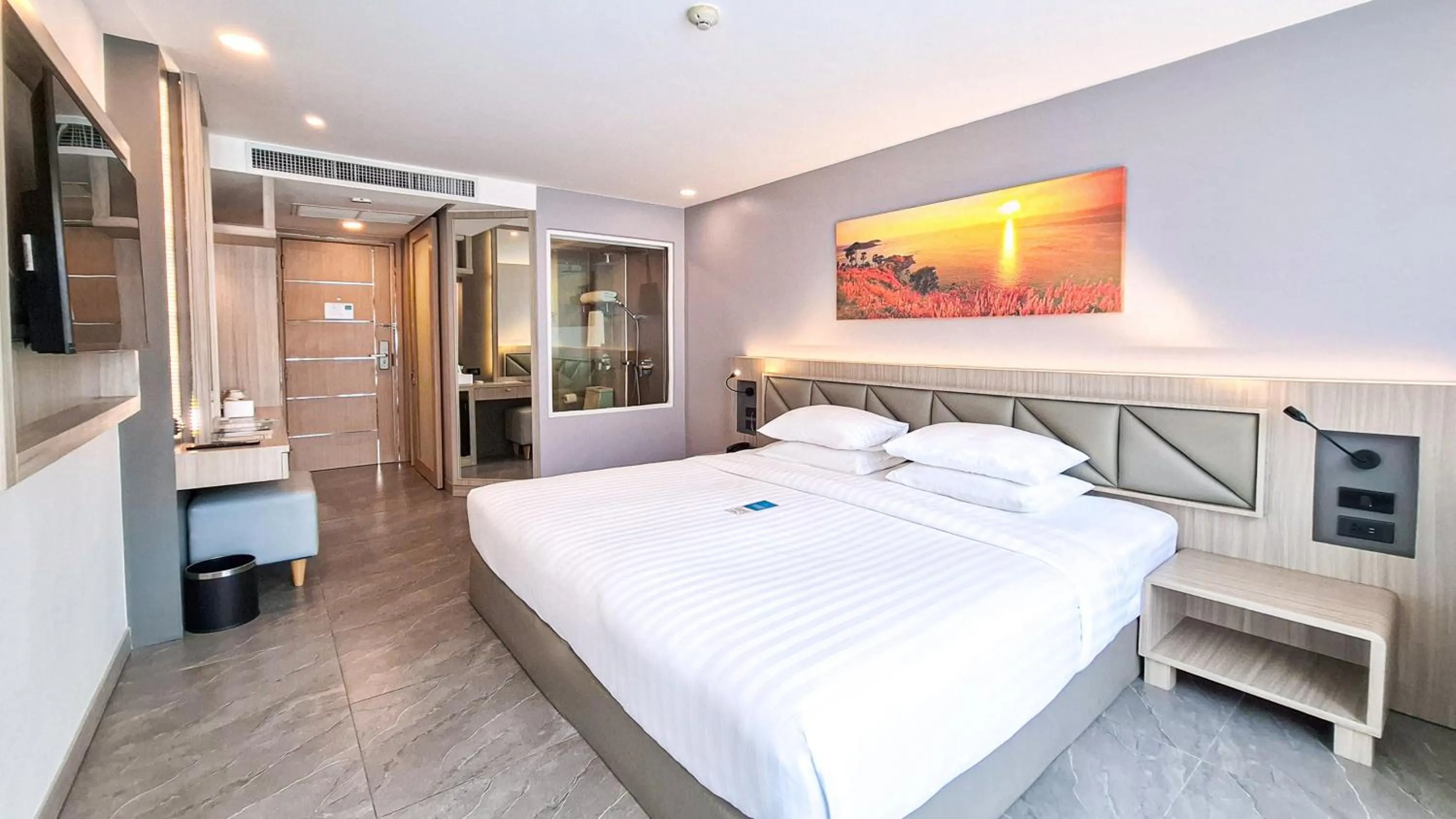 Bed in Clarian Hotel Beach Patong