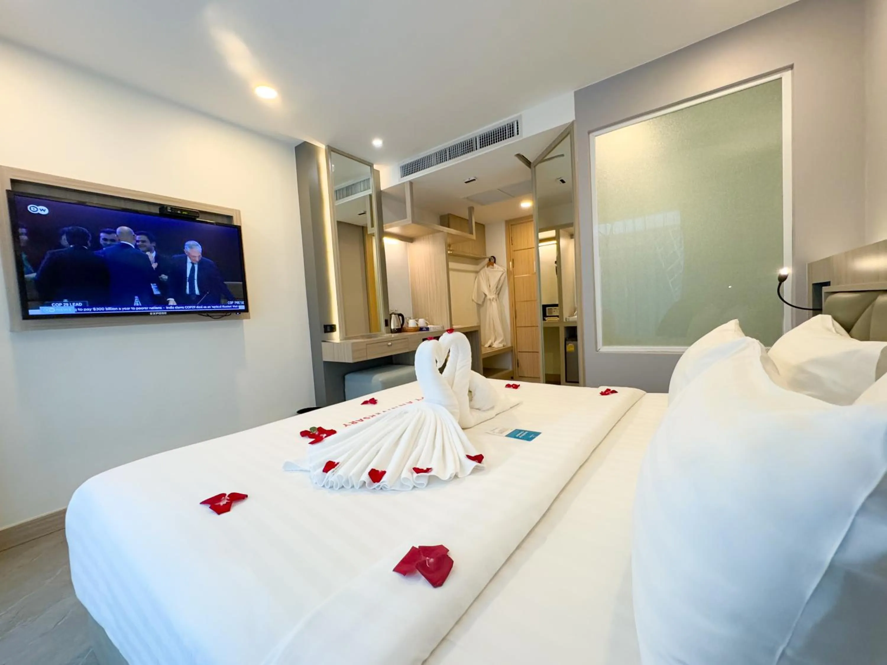 Bed in Clarian Hotel Beach Patong