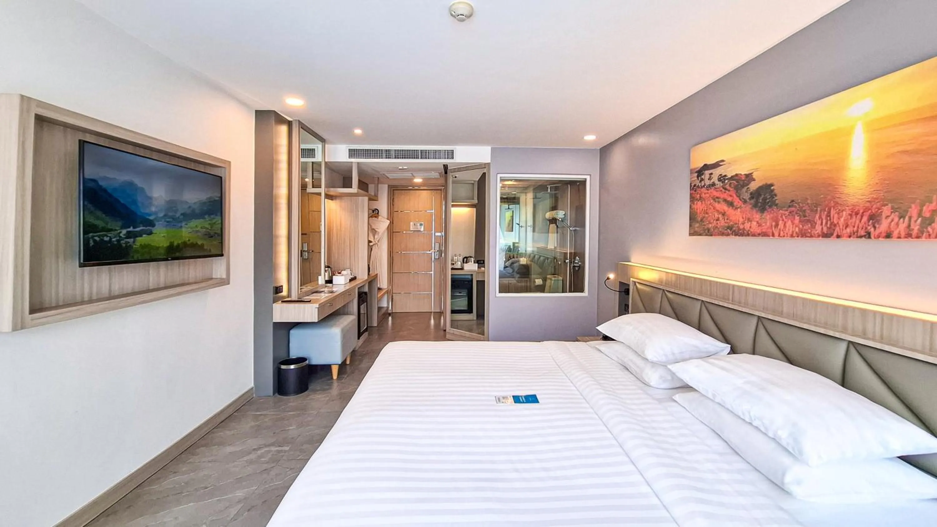 Bed in Clarian Hotel Beach Patong