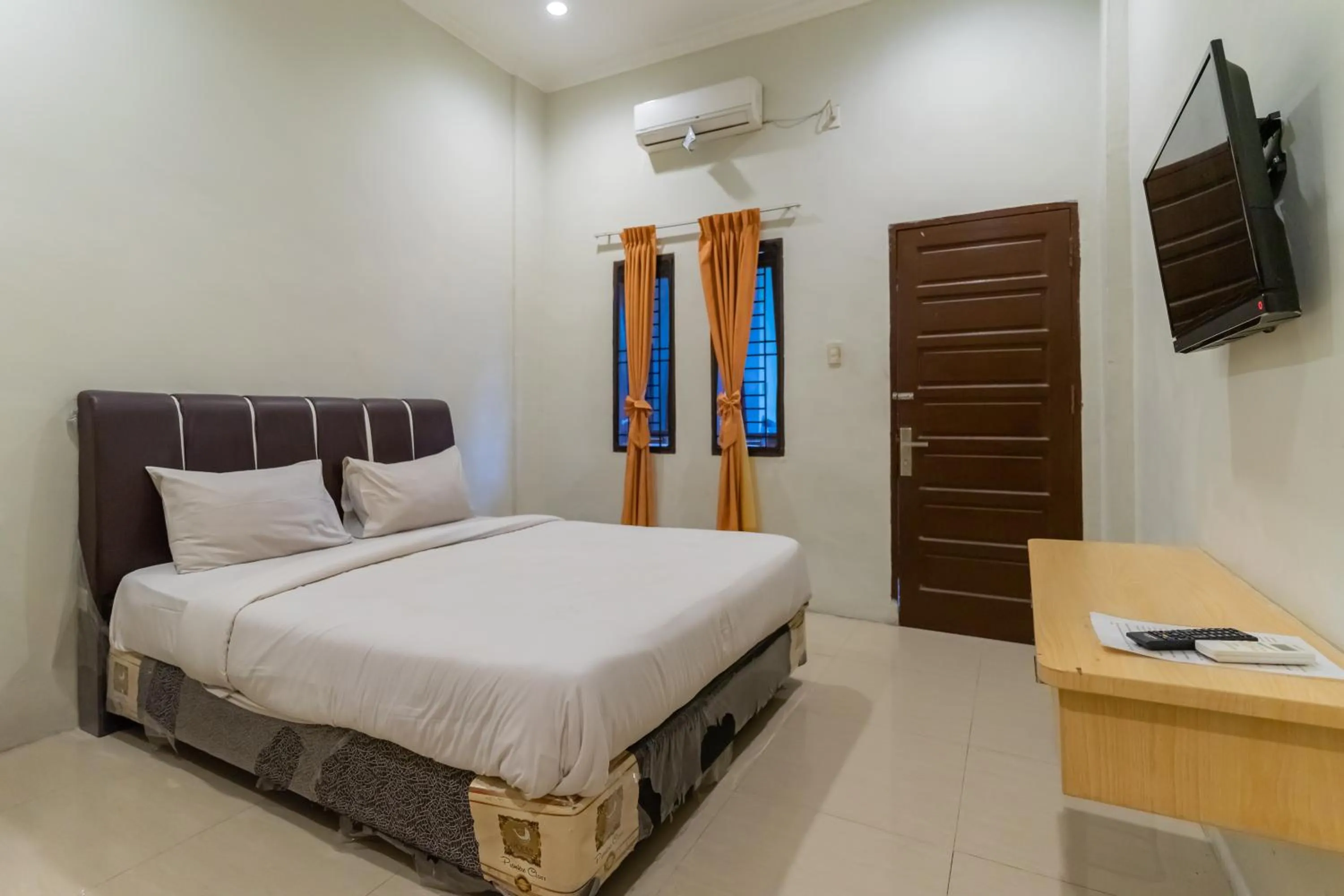 Bed in Vandolia Guest House Medan RedPartner