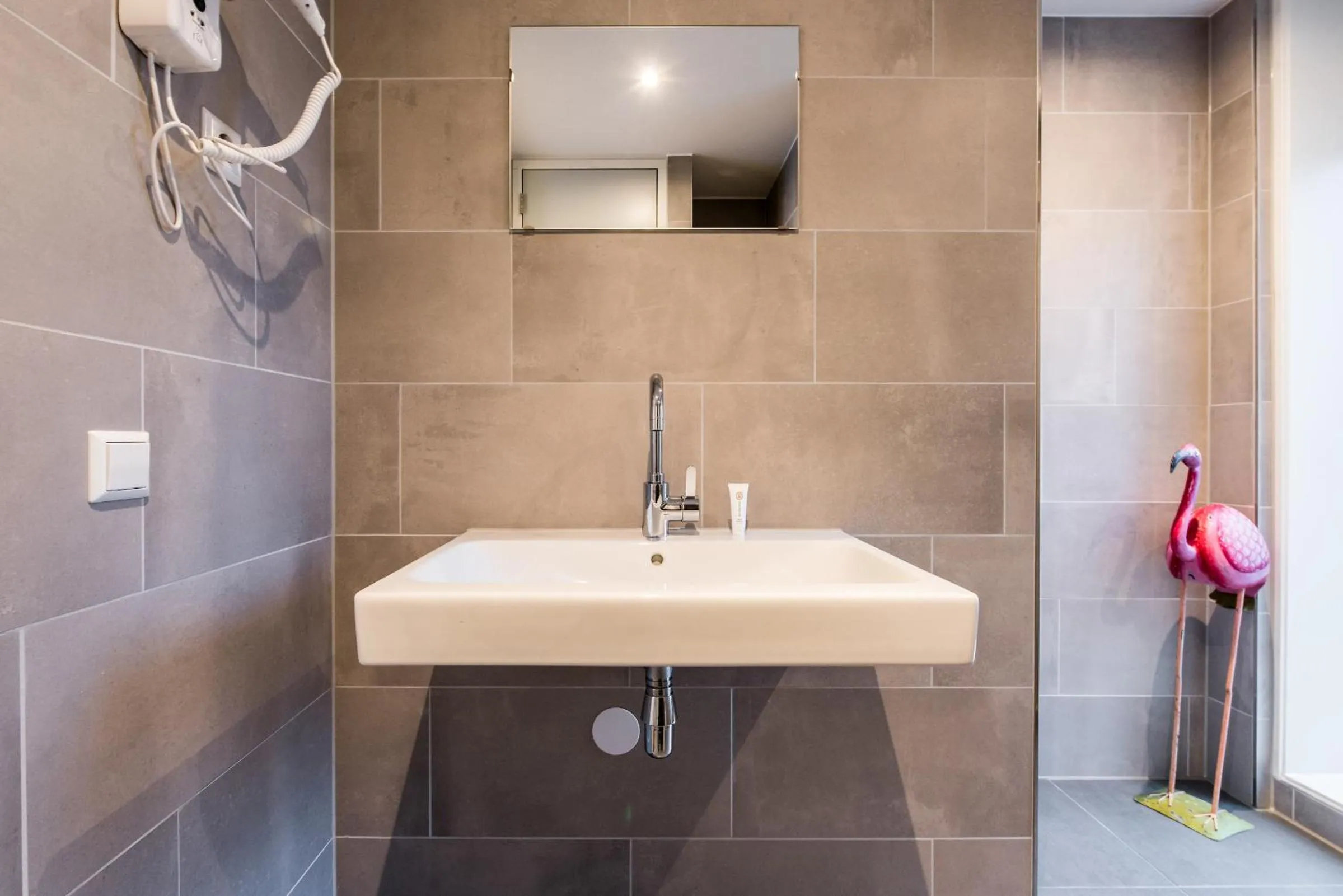 Bathroom in YAYS Amsterdam North by Numa