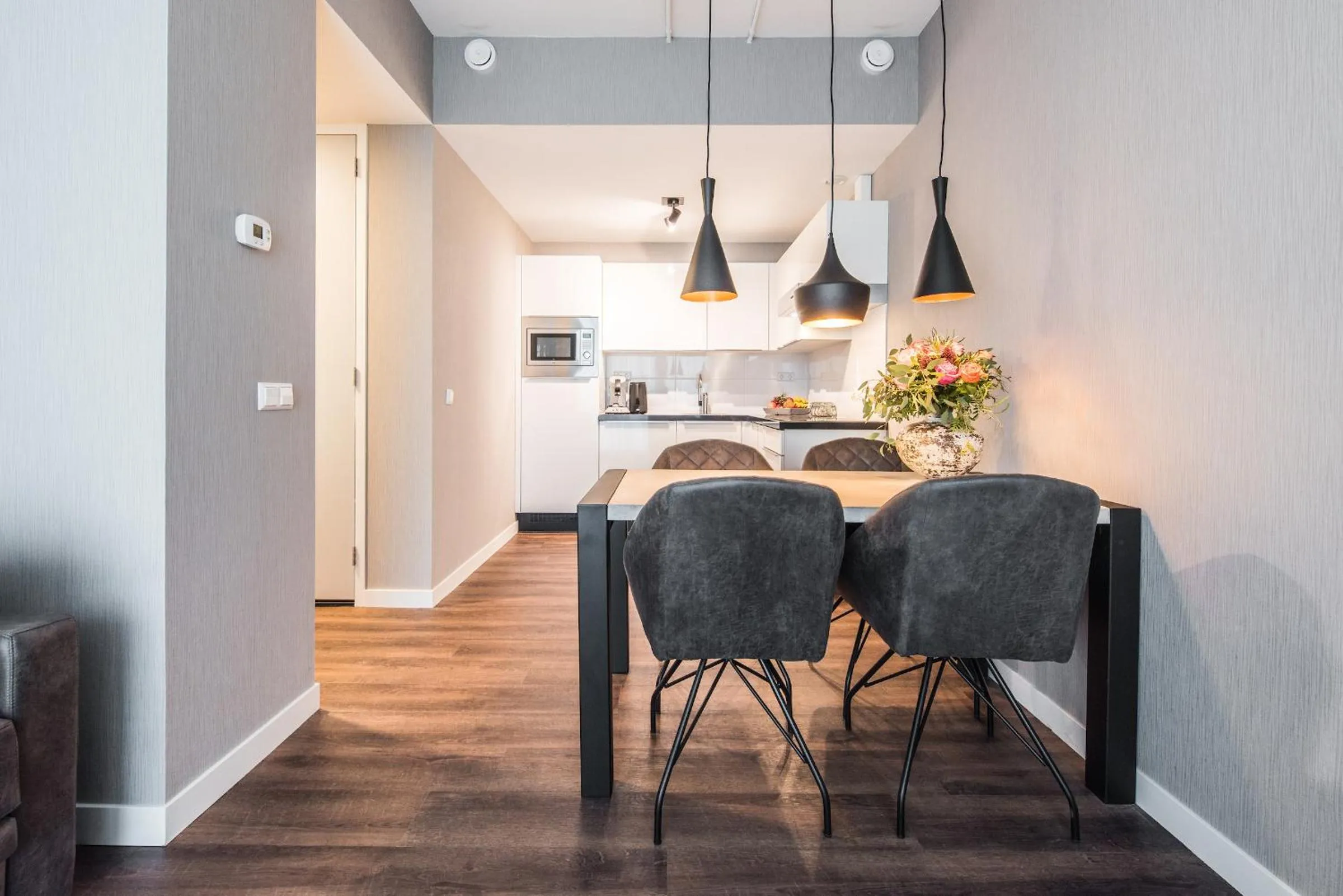 Dining area in YAYS Amsterdam North by Numa