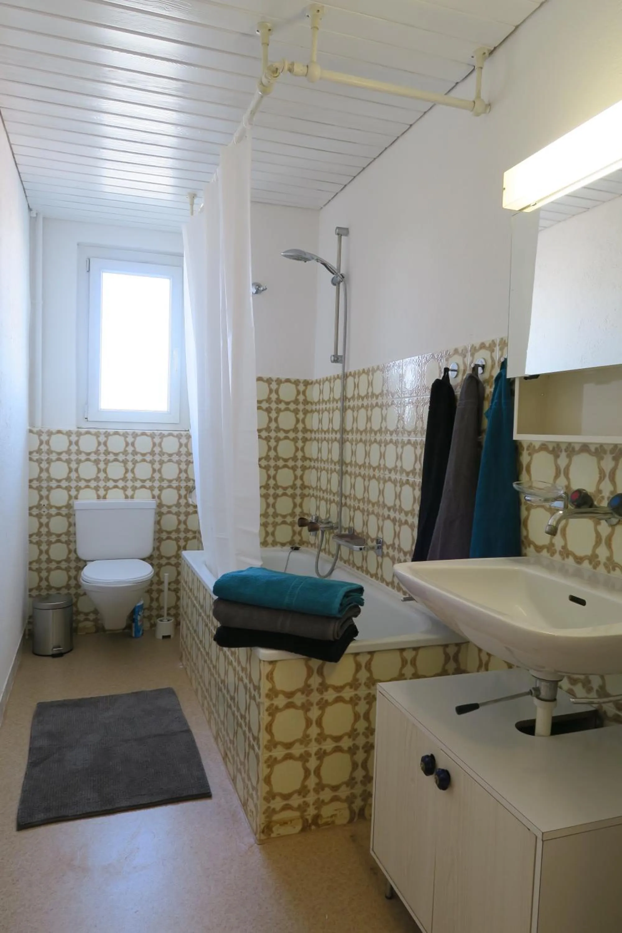 Toilet in Zurich Furnished Apartments