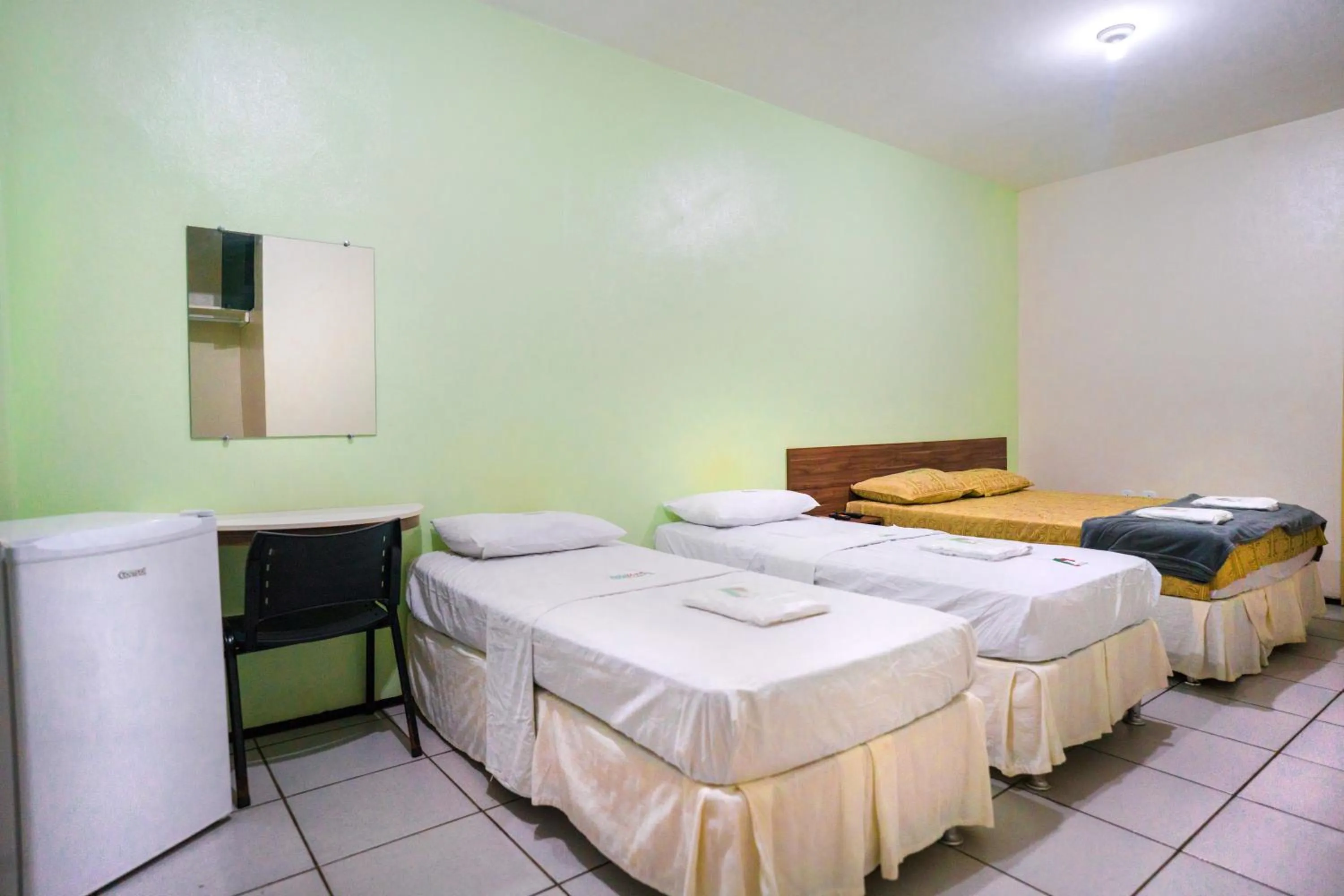 Bed in Hotel Pinheiro