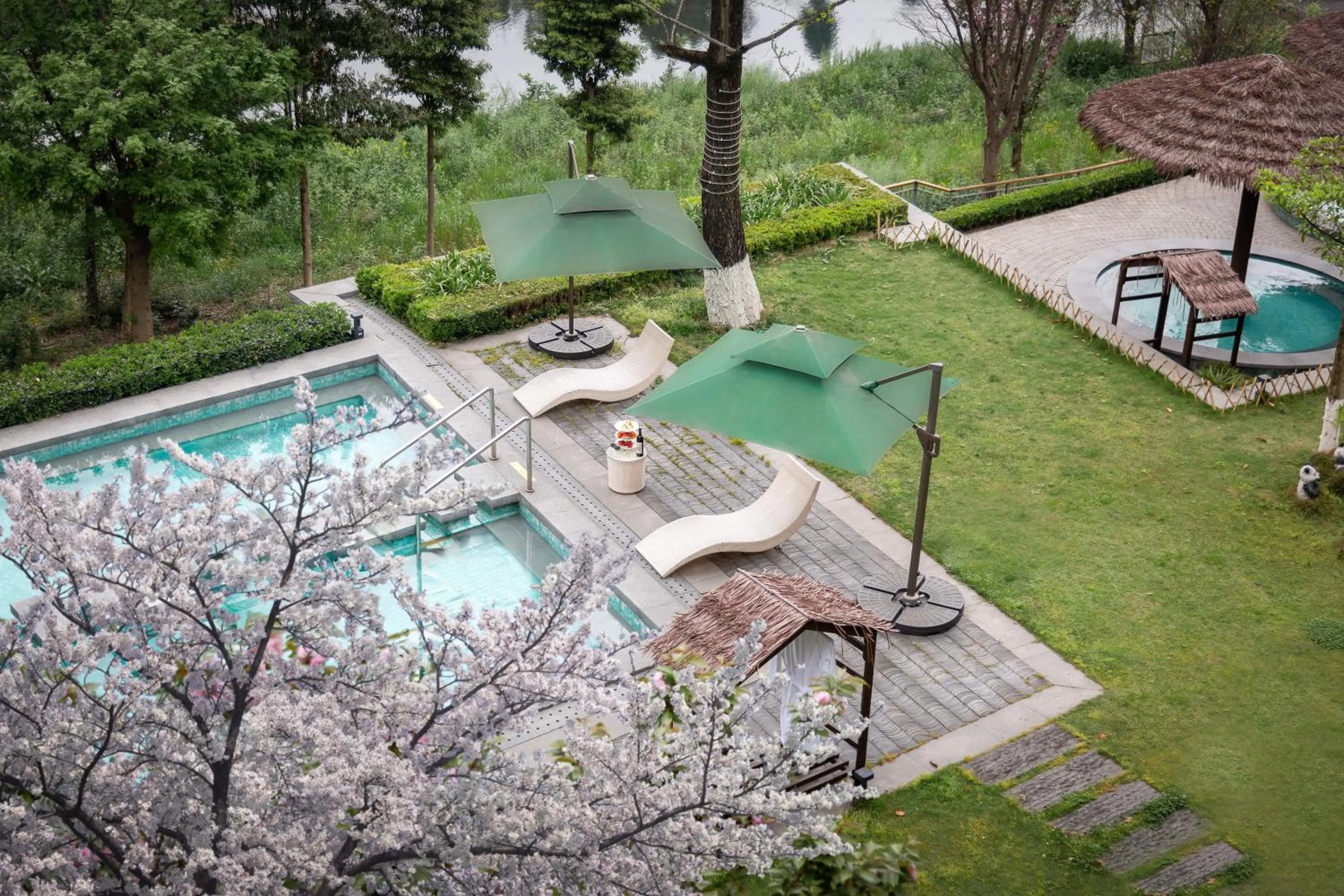 Swimming pool in Holiday Inn Express Emei Mountain, an IHG Hotel
