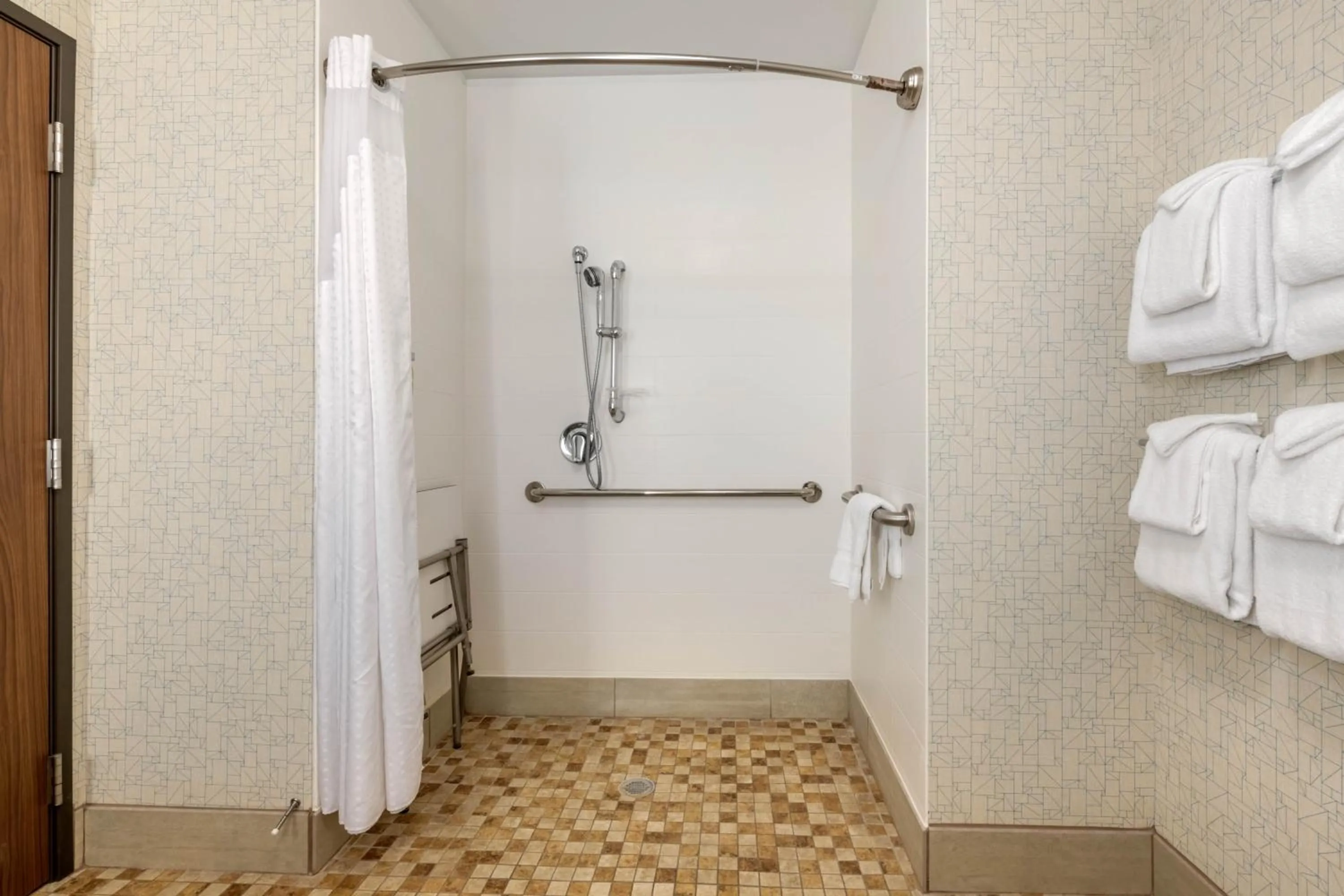 Photo of the whole room in Holiday Inn Express & Suites - St. Petersburg - Madeira Beach by IHG