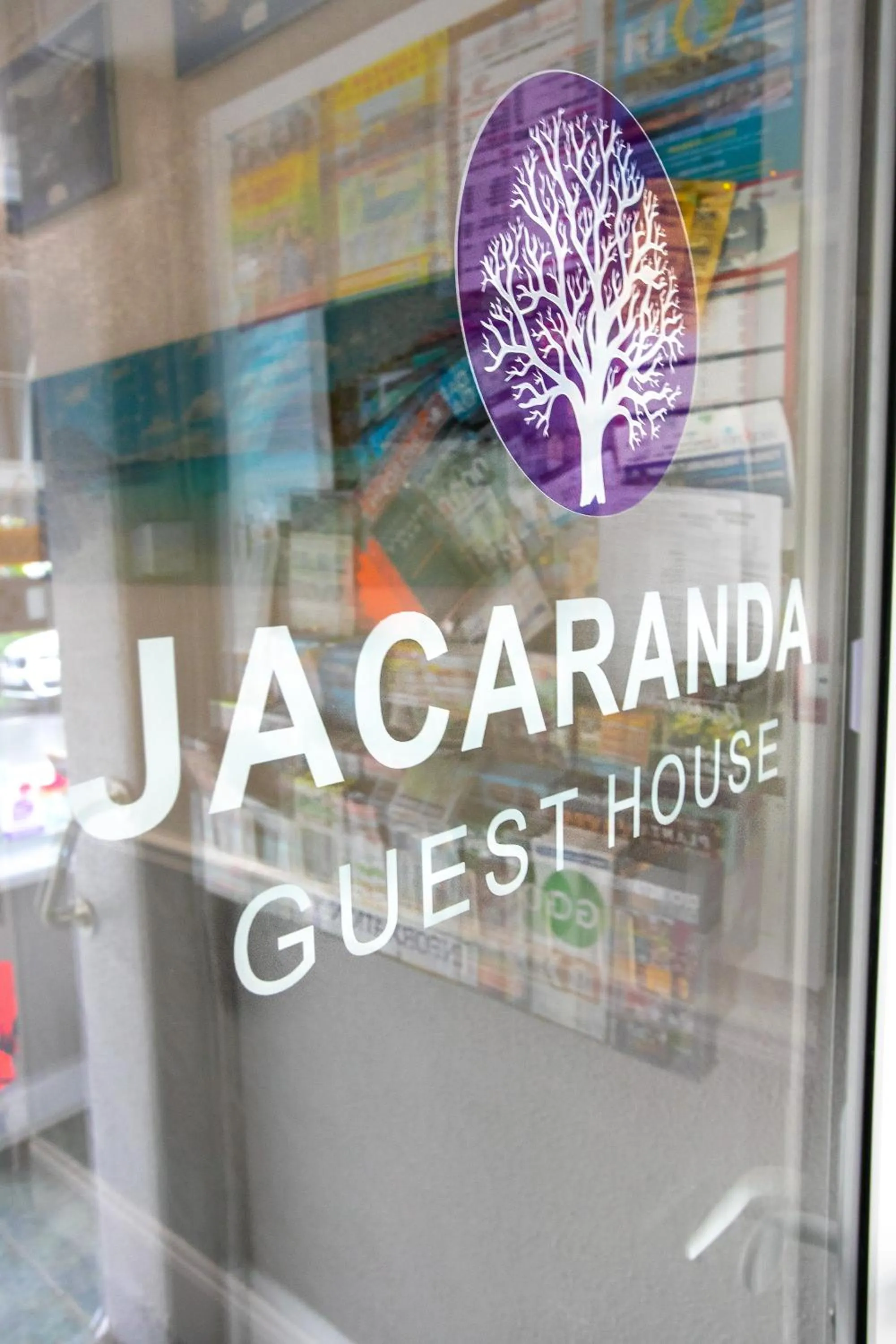 Property logo or sign in Jacaranda Hotel