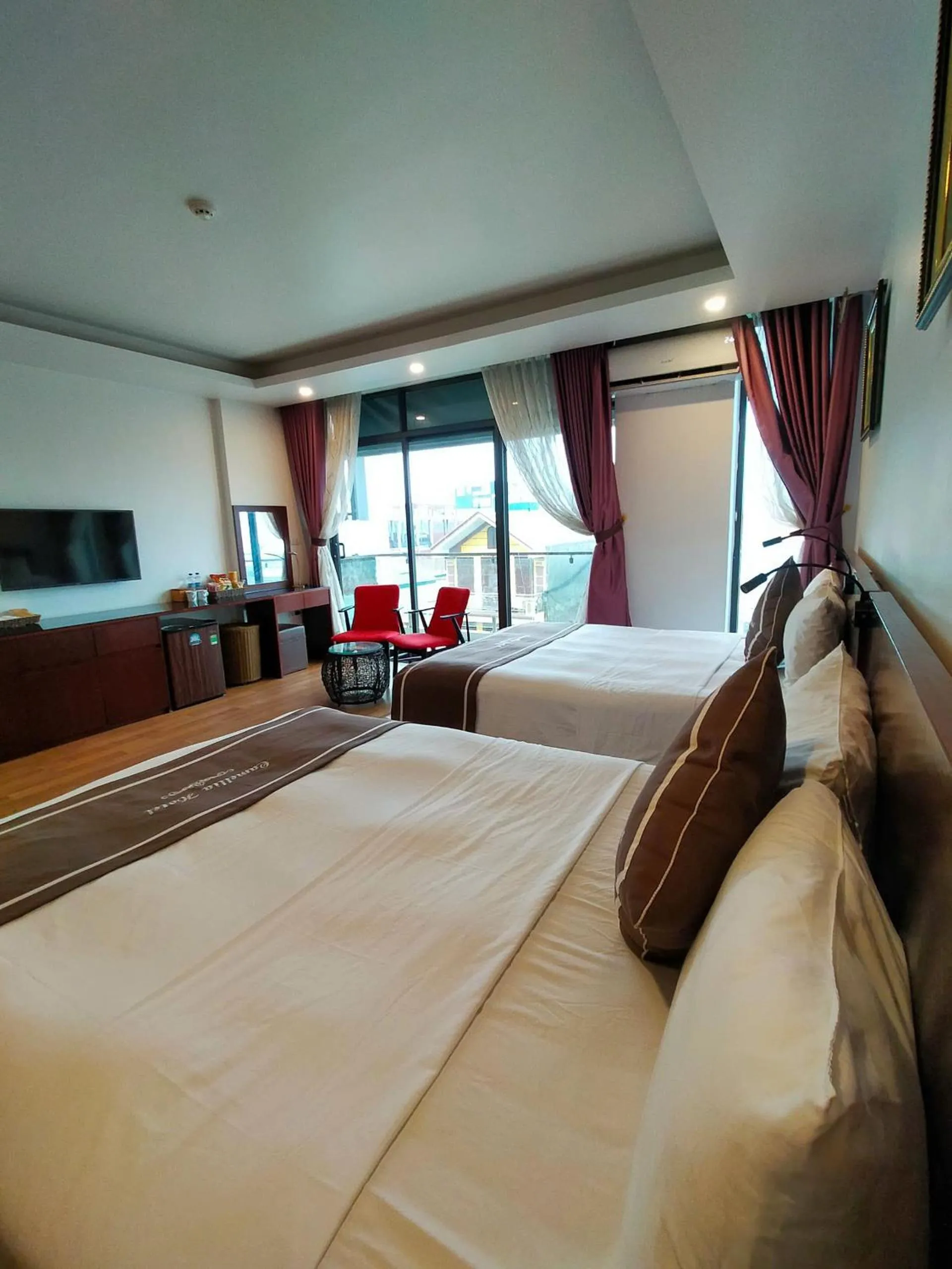Photo of the whole room, Bed in Camellia Hotel