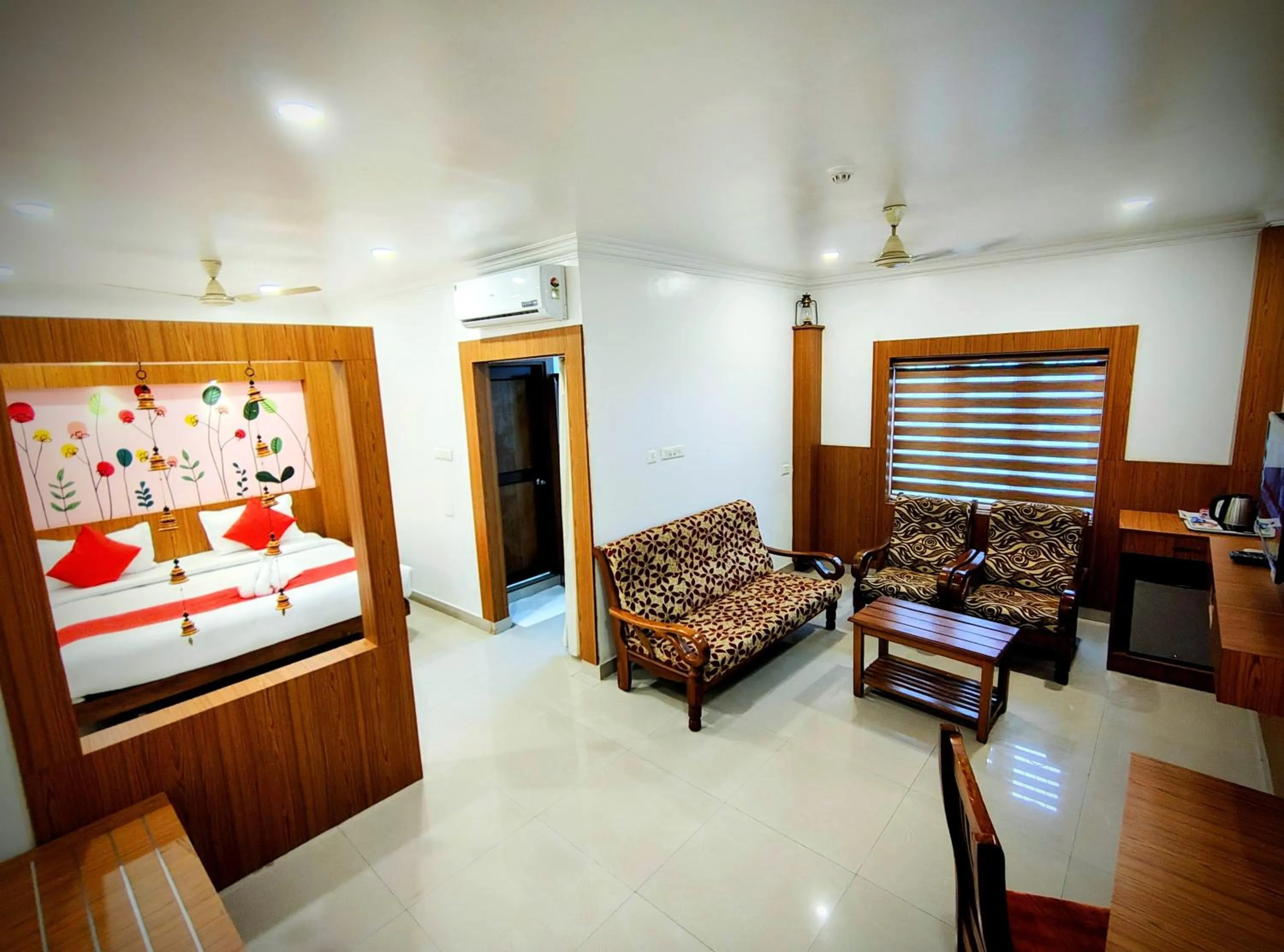 Living room, Bed in Sneha Inn