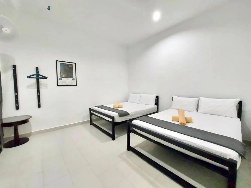 Bed in Belukar Lodges Private Homestay