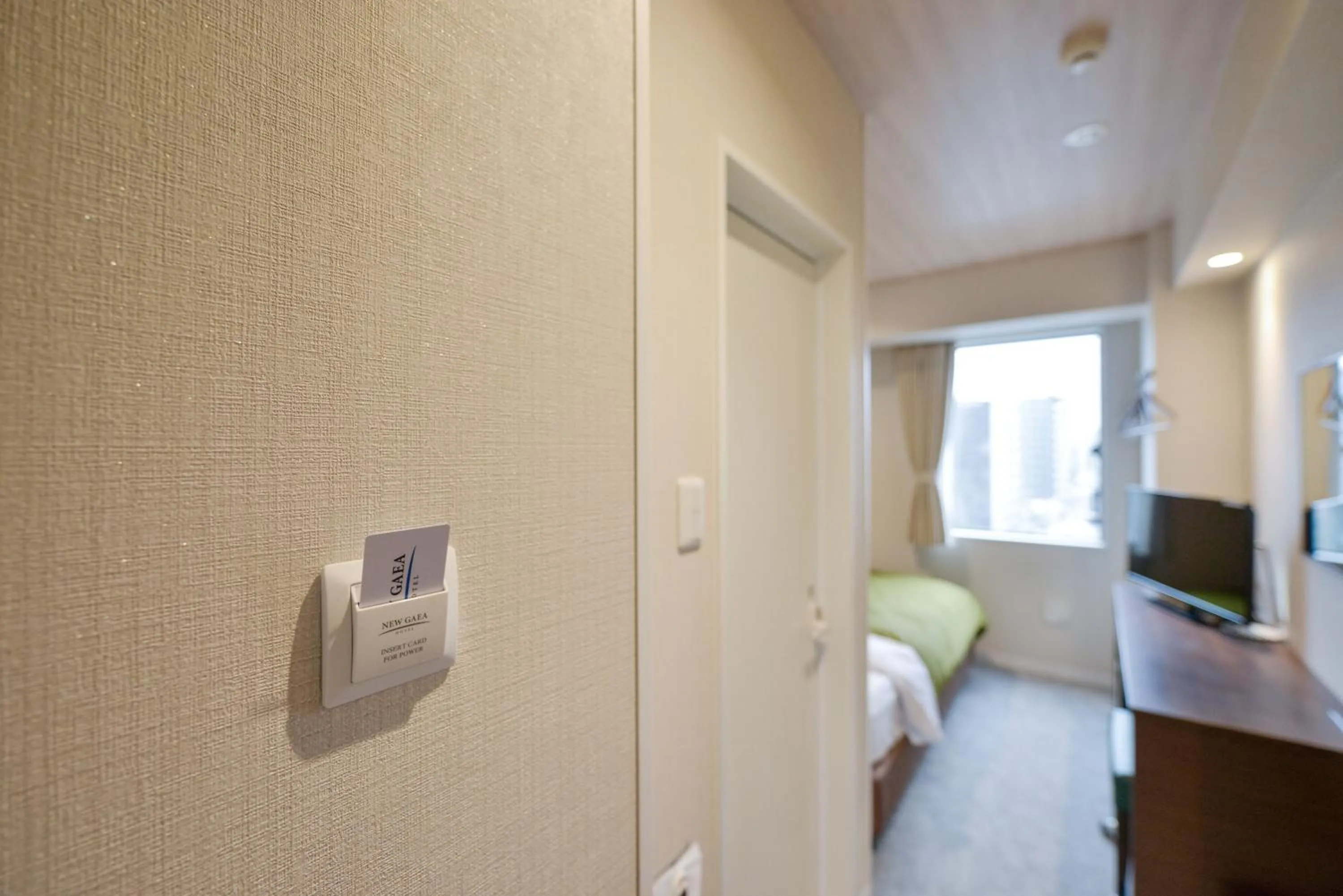 Photo of the whole room, Bed in Hotel New Gaea Kamigofuku