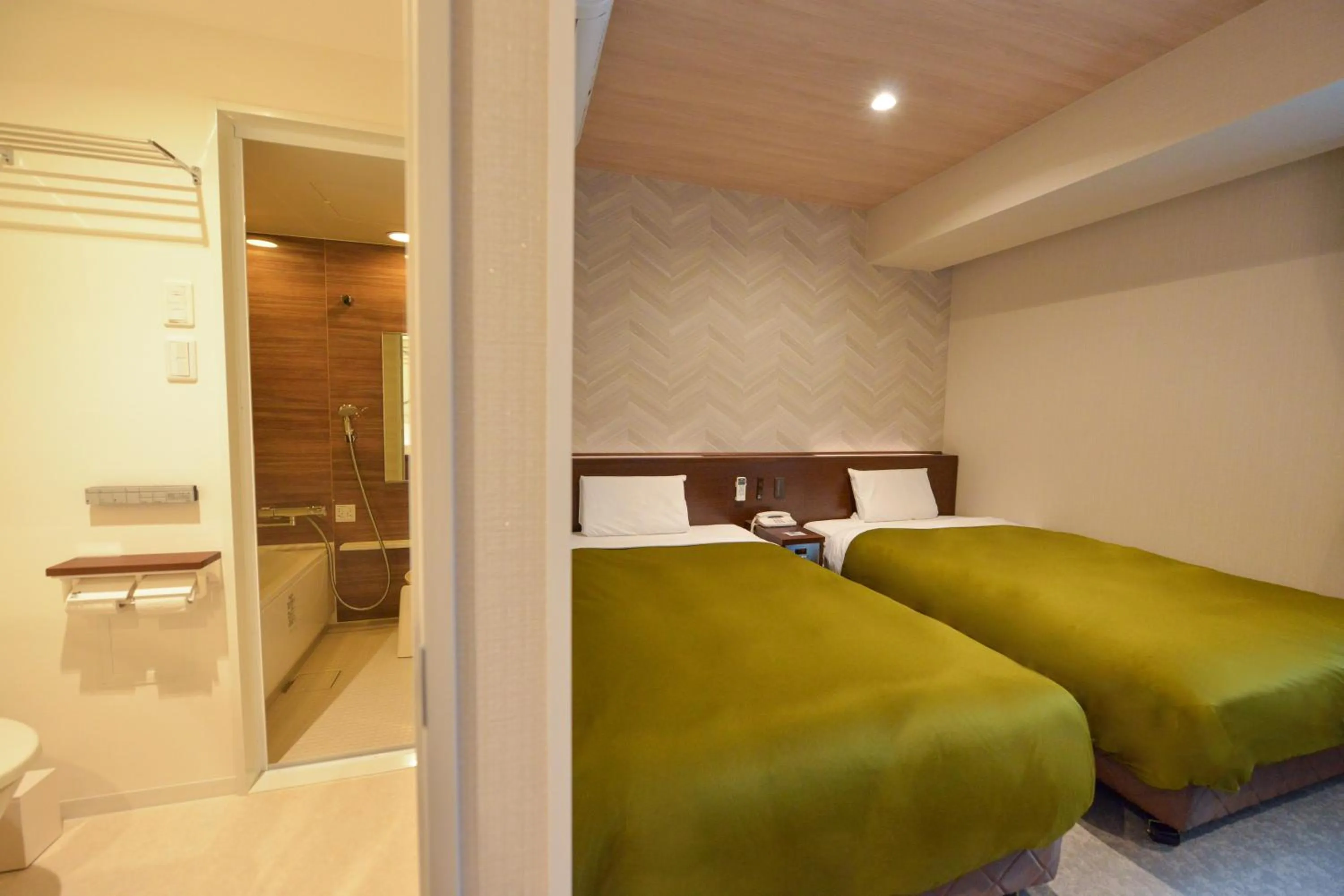 Photo of the whole room, Bed in Hotel New Gaea Kamigofuku