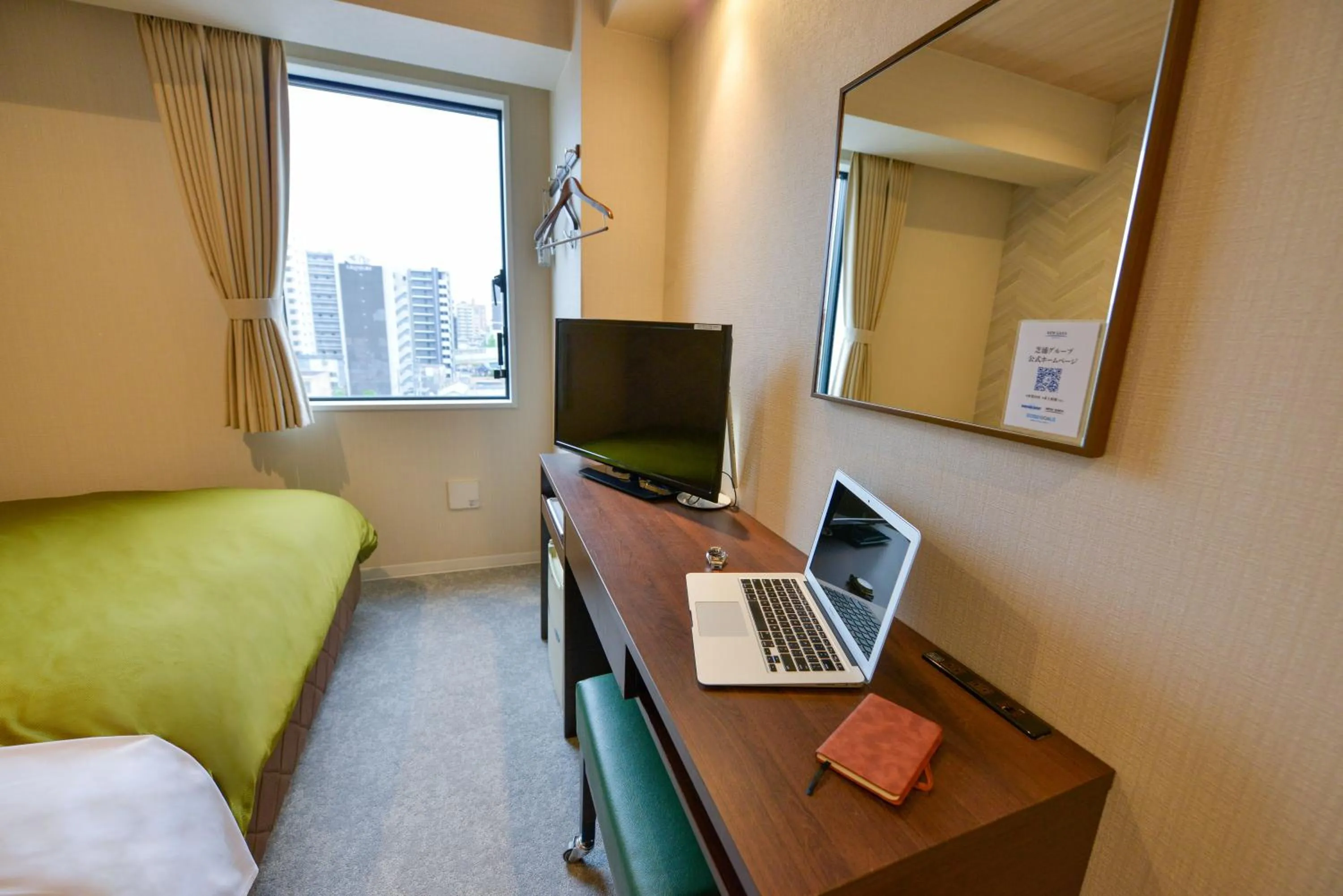Photo of the whole room, Bed in Hotel New Gaea Kamigofuku