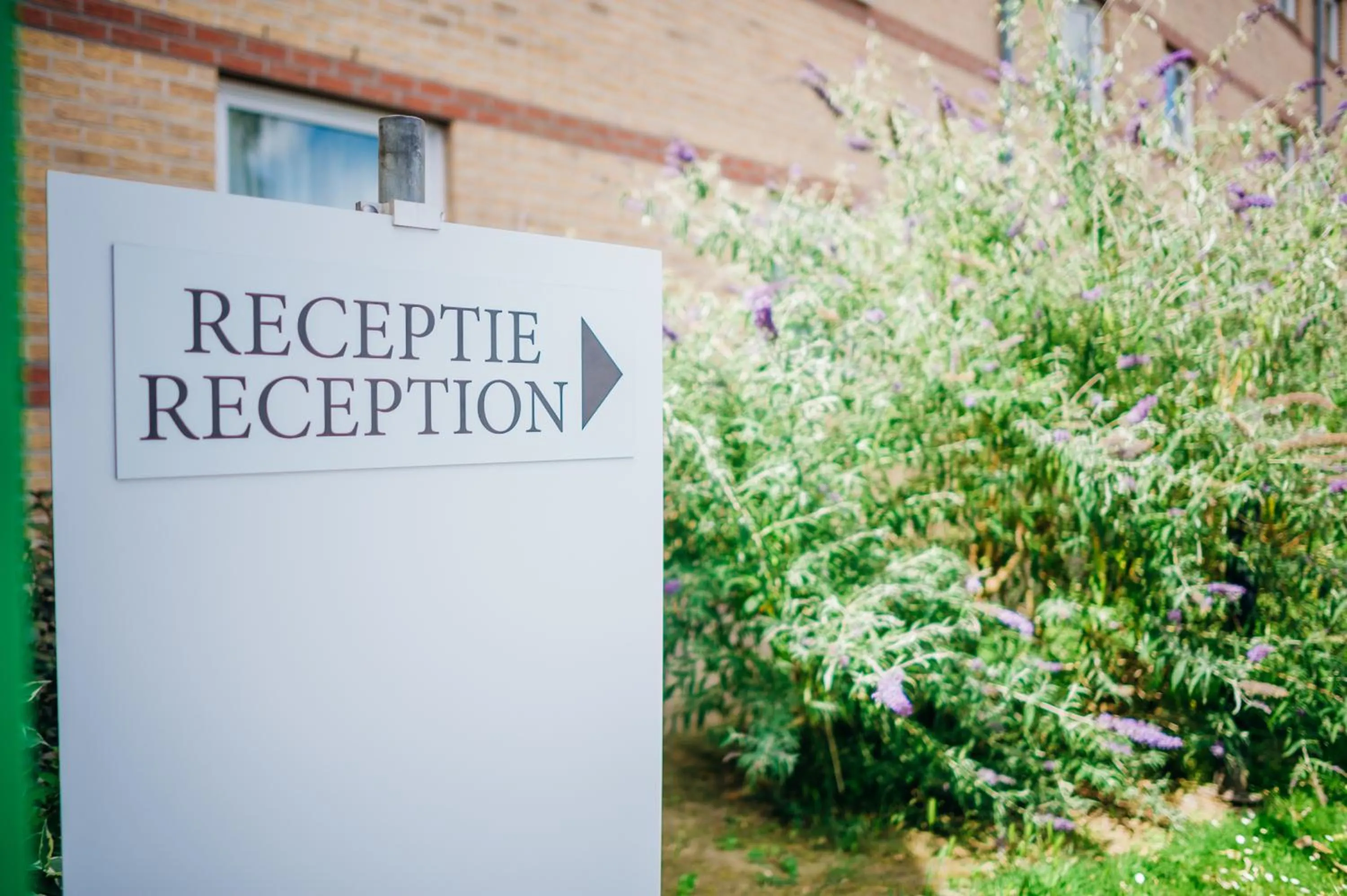 Property logo or sign in DC Hotel & Restaurant Brussels South