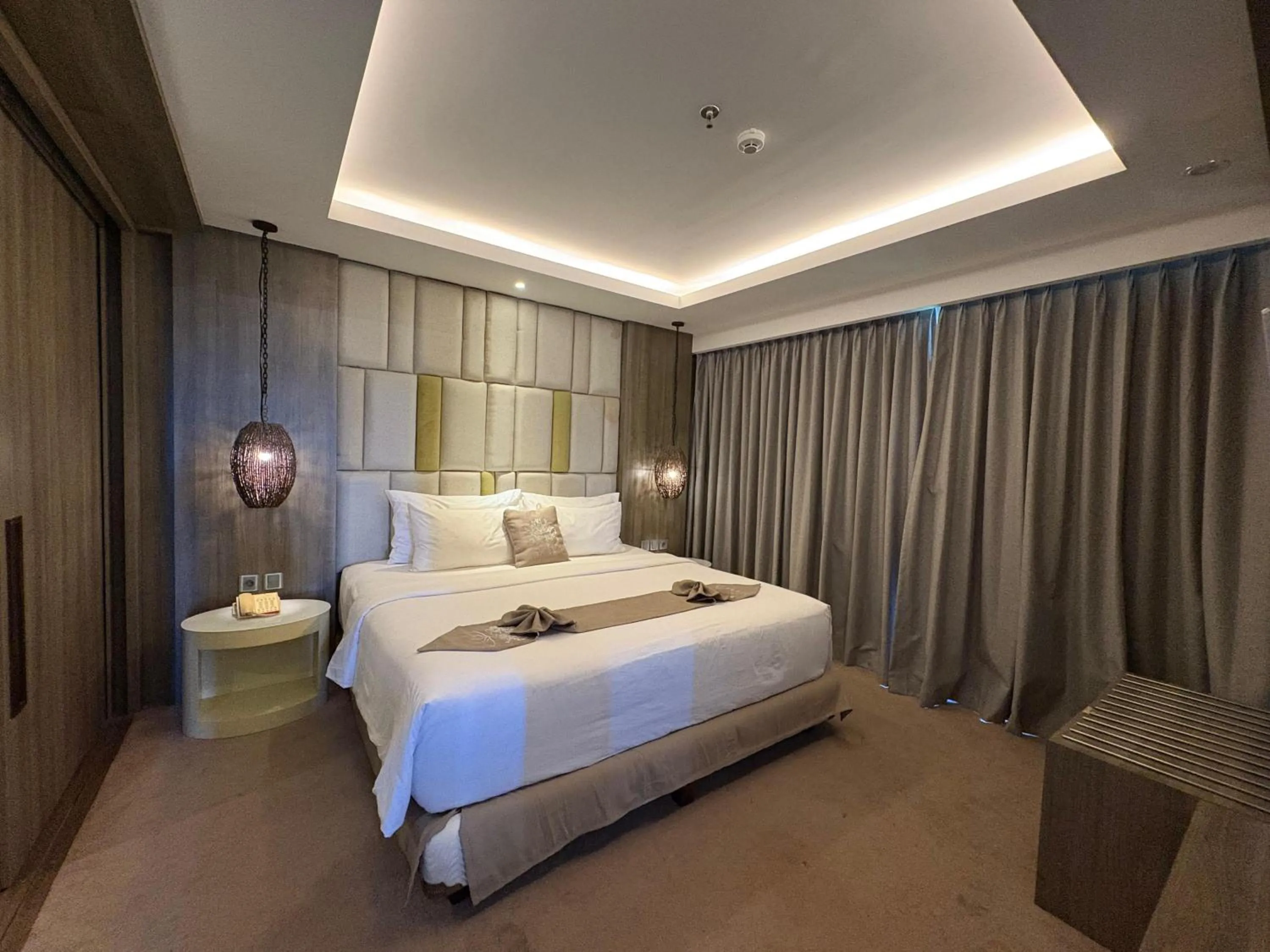 Bed in The Crystal Luxury Bay Resort Nusa Dua