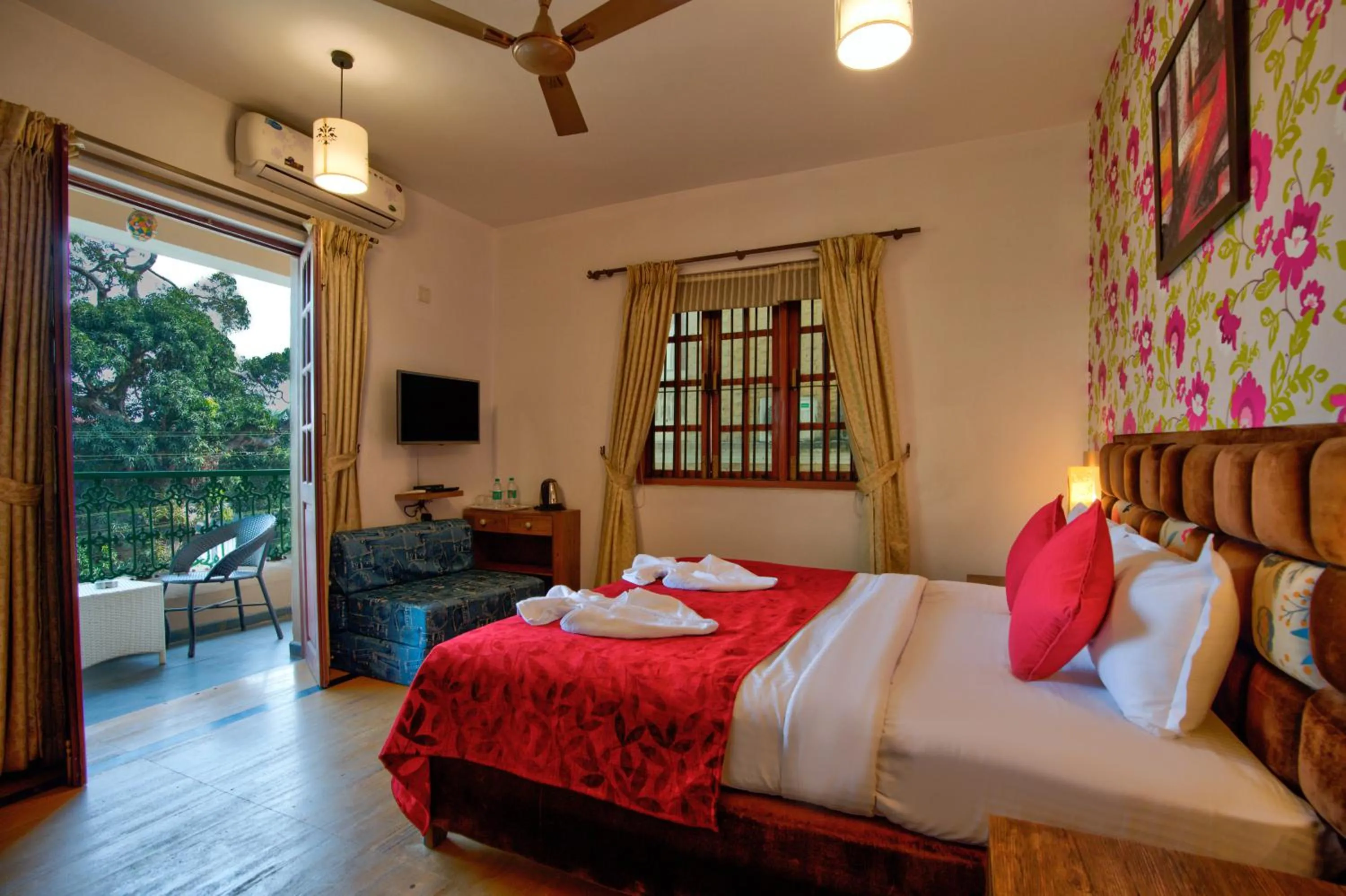 Seating area, Bed in Resort Martins Siesta , A Portuguese Heritage Resort in Calangute