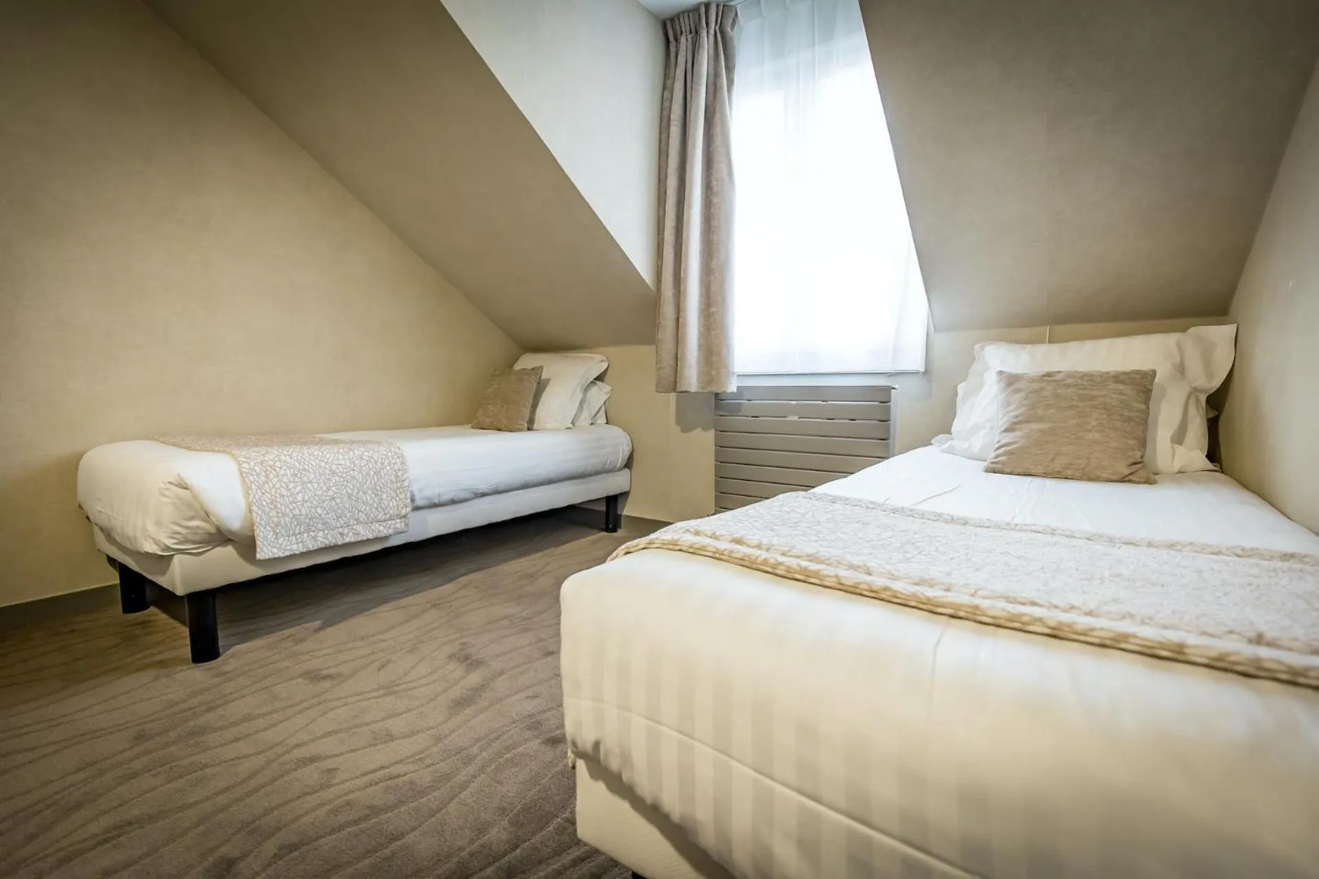 Bed in Hôtel De Brunville & Spa