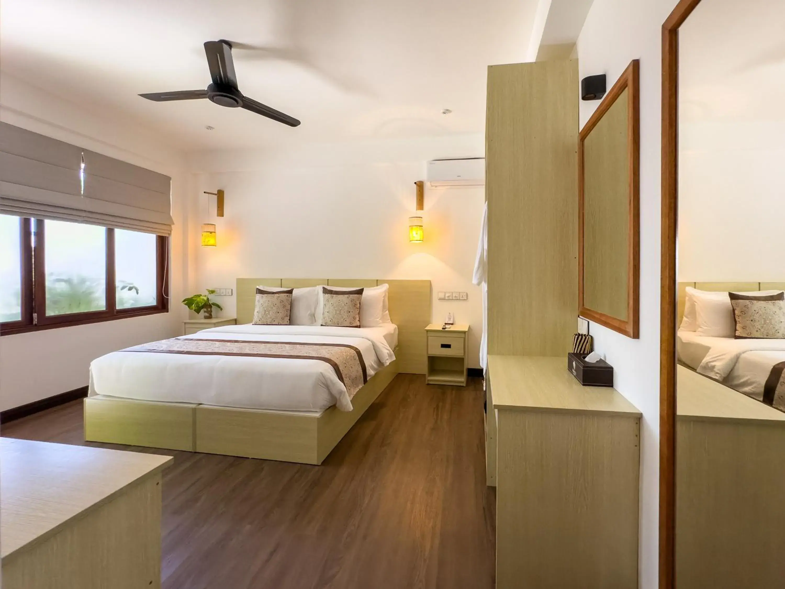 Deluxe Double or Twin Room with Garden View in Ithaa Inn Kamadhoo Deluxe Double or Twin Room with Garden View in Ithaa Inn Kamadhoo