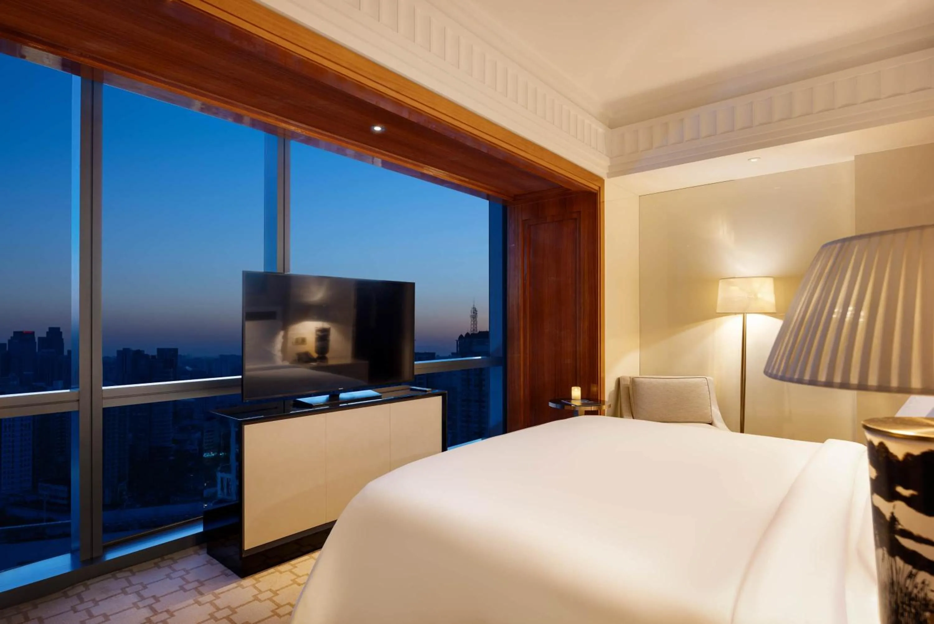 Bed in Four Seasons Hotel Tianjin