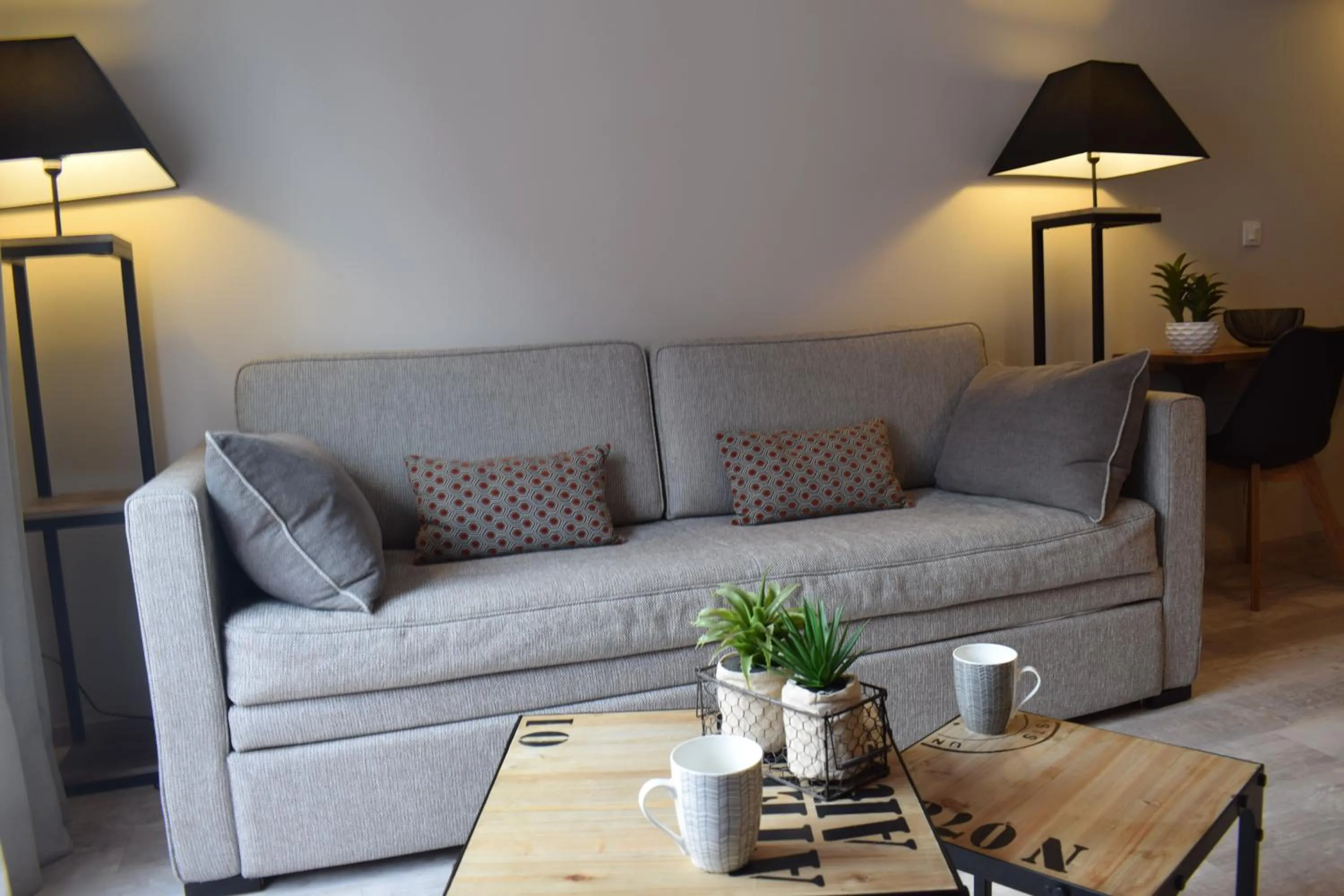 Living room in Le Trophée Boutique Hôtel Spa- La Loggia Appart'hôtel