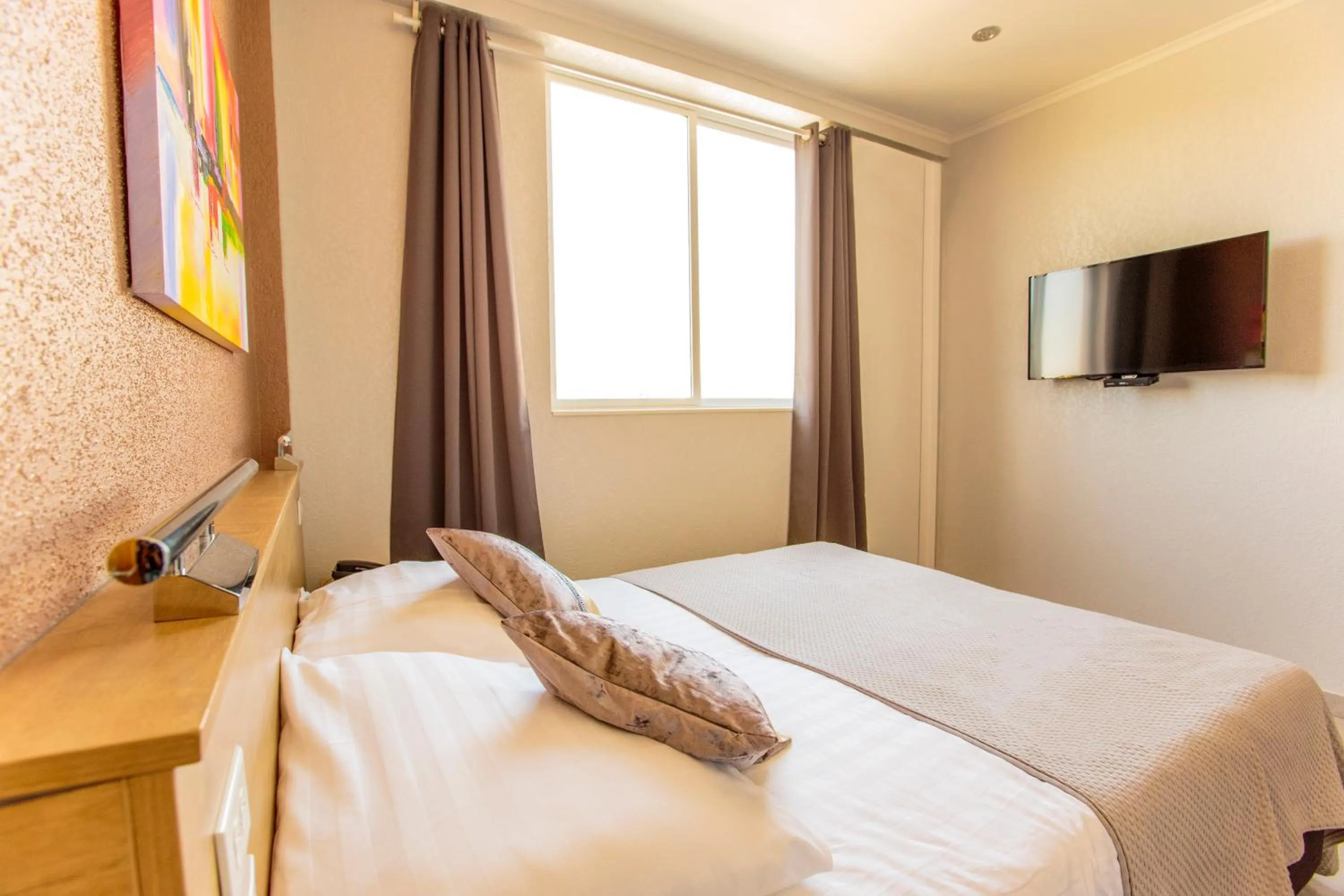 Photo of the whole room, Bed in Q-Inn Boutique Hotel