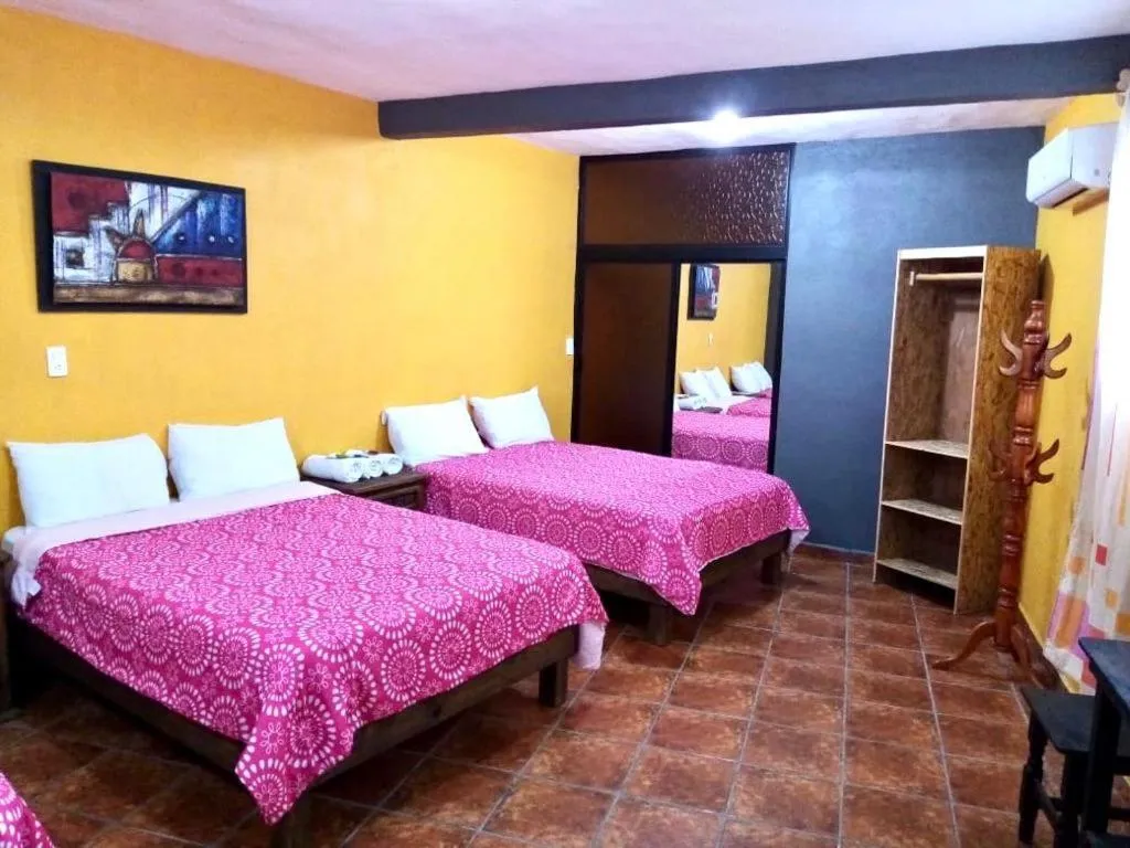 Bed in POSAD FAMILIAR EL PARAiSO