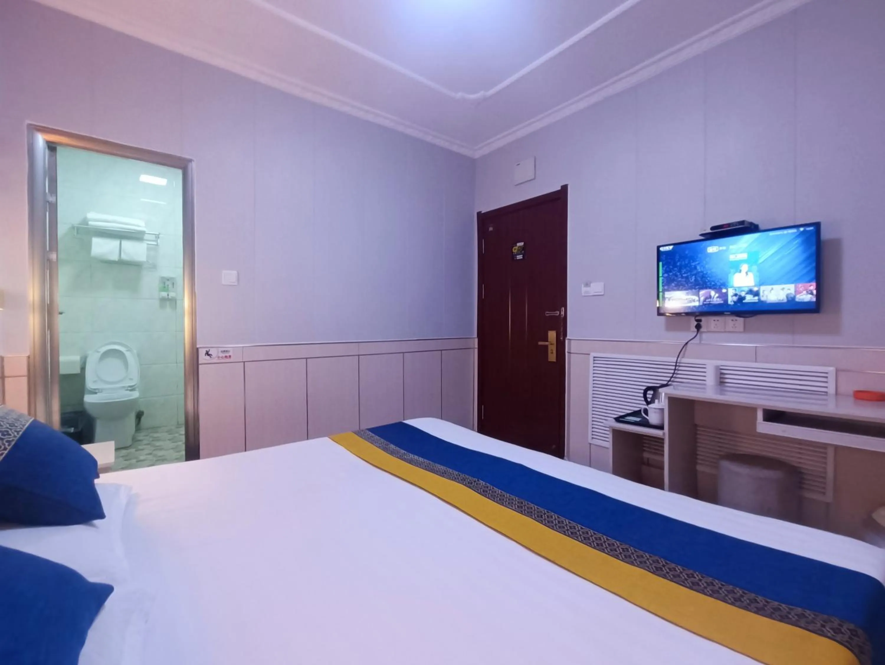 Bed in Qufu Garden Hotel