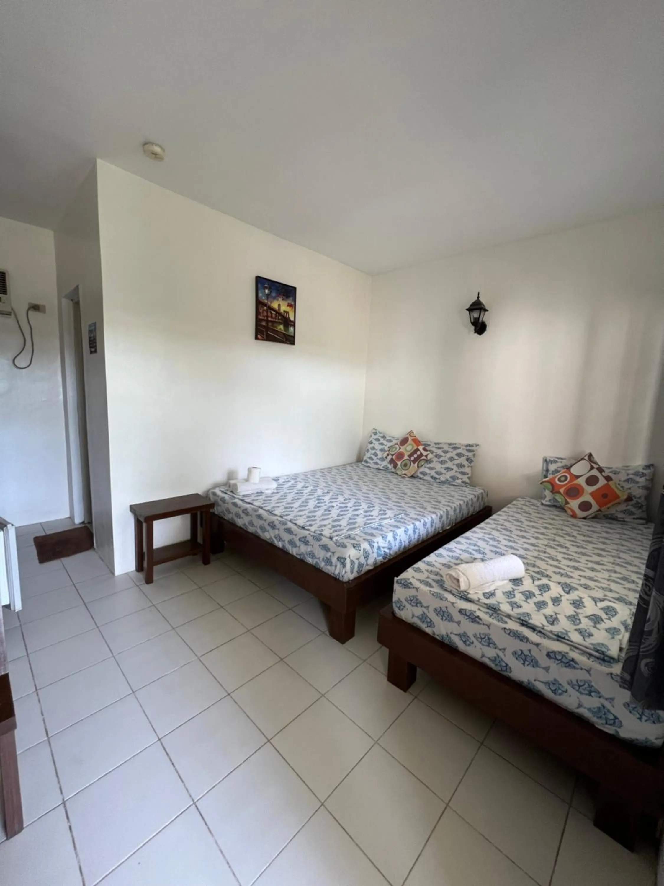 Bed in Sundown Resort & Austrian Pension House