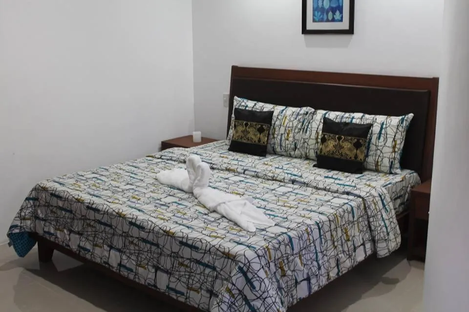 Bed in Sundown Resort & Austrian Pension House