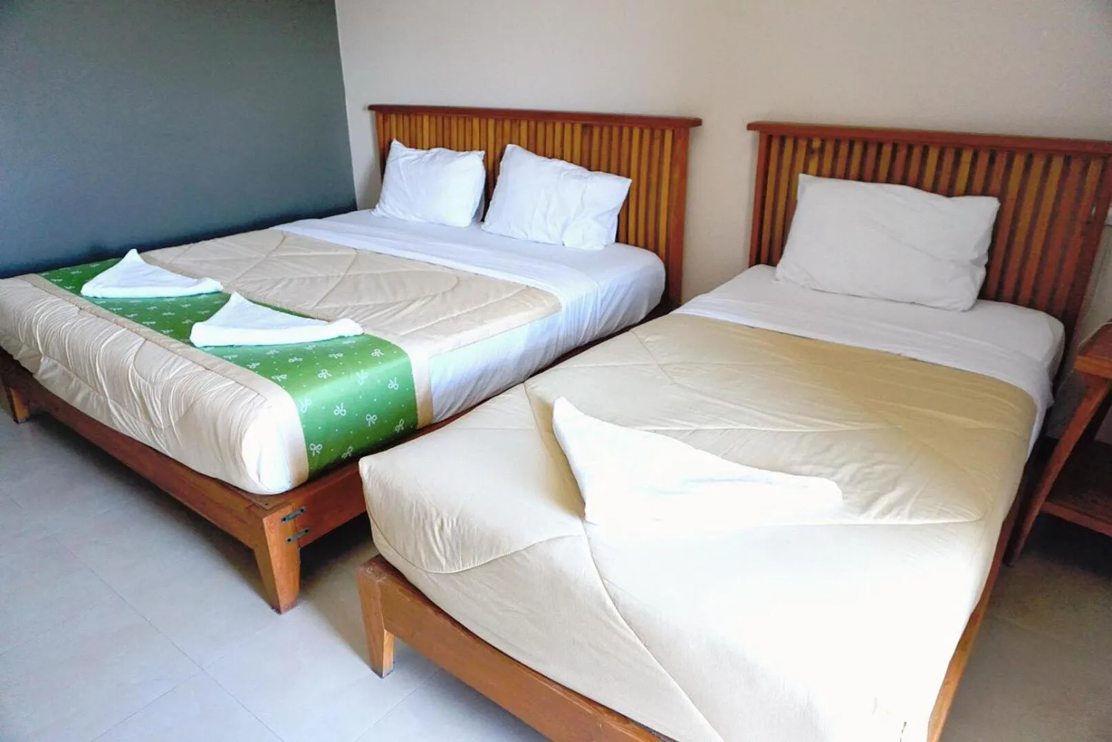 Bed in Maihom Resort Hotel