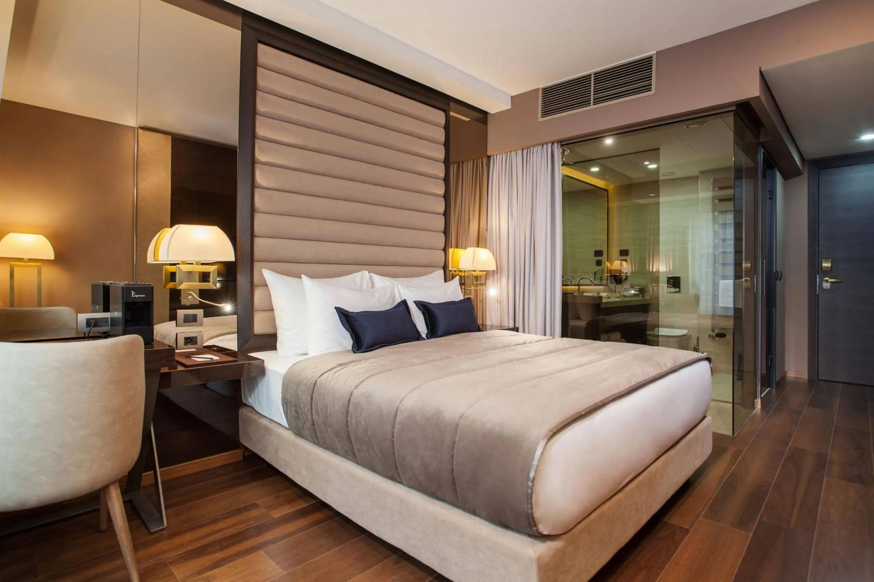 Bed in SAINT TEN Boutique Hotel, Small Luxury Hotels