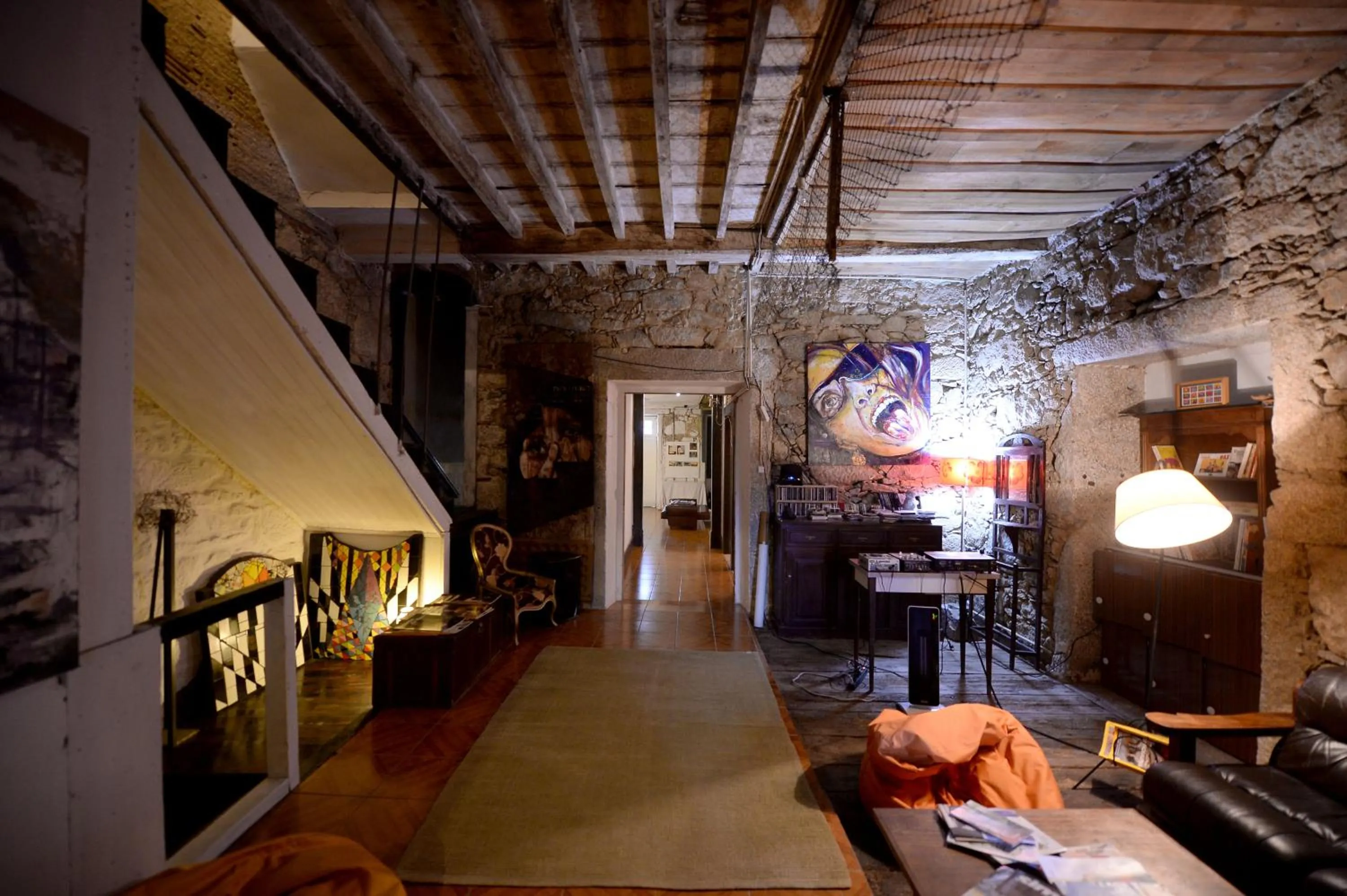 Communal lounge/ TV room in Family Adams House Hostel