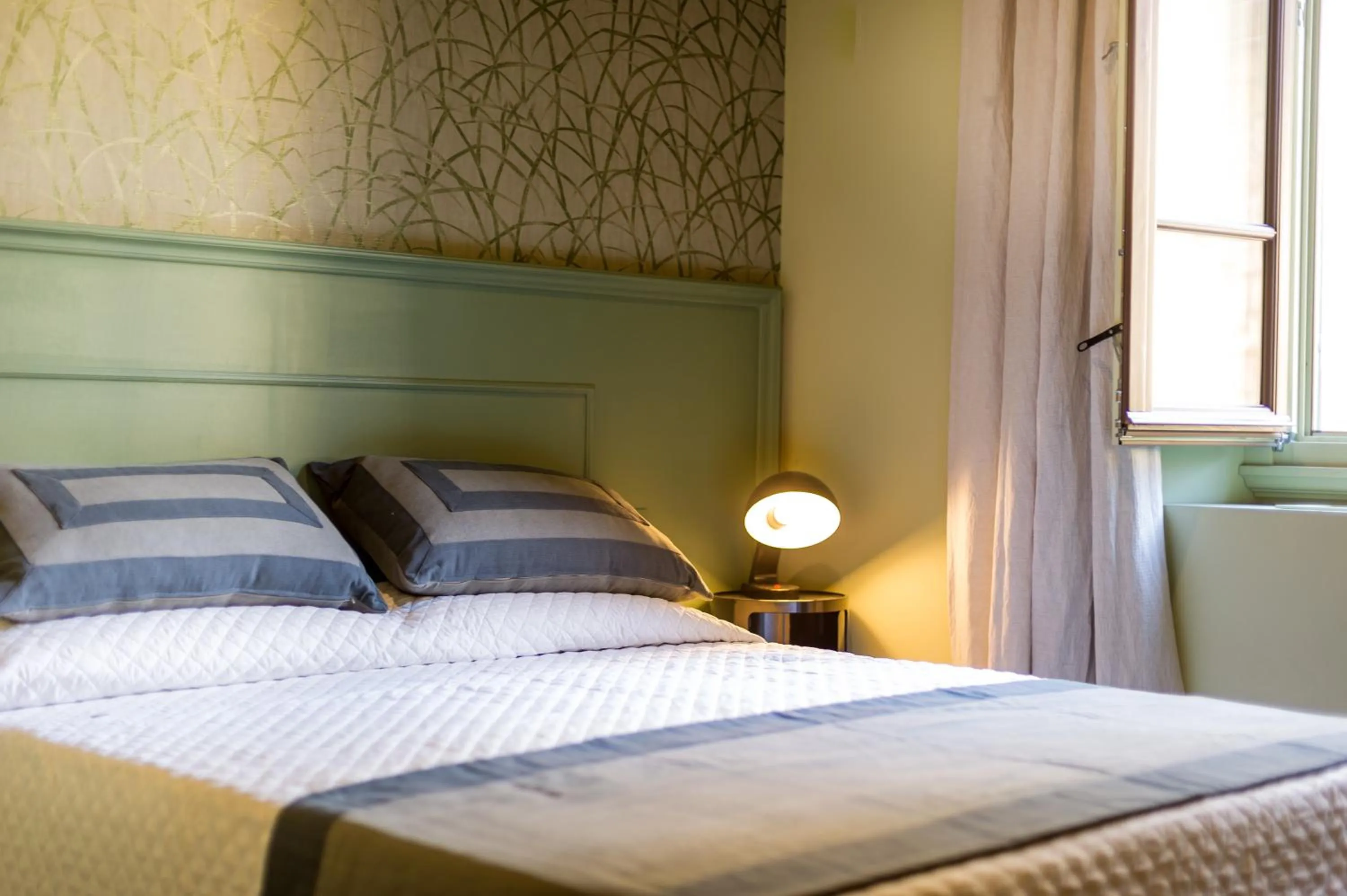 Bed in Arnobio Florence Suites