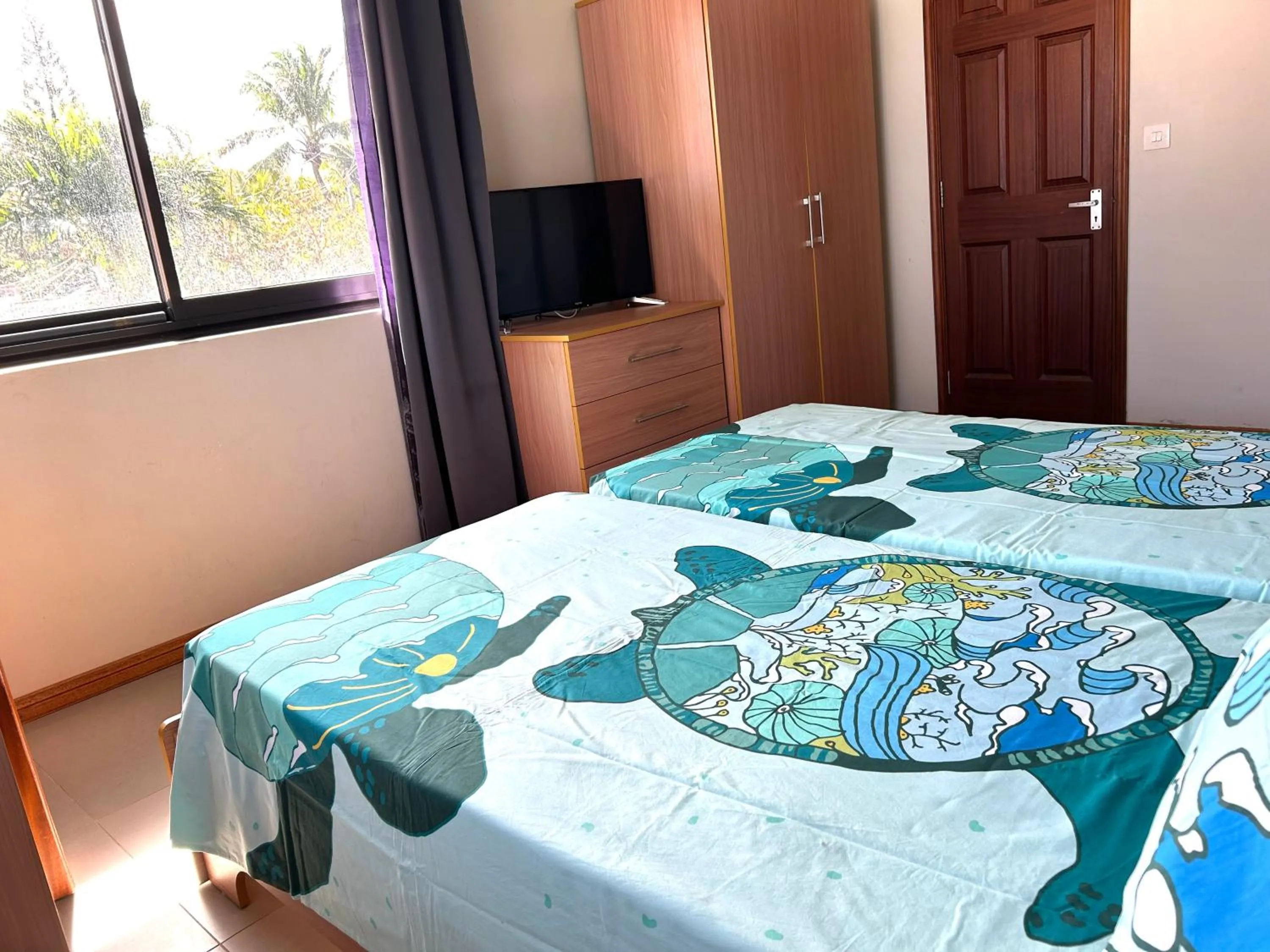 Photo of the whole room, Bed in Blue Beryl Guest House