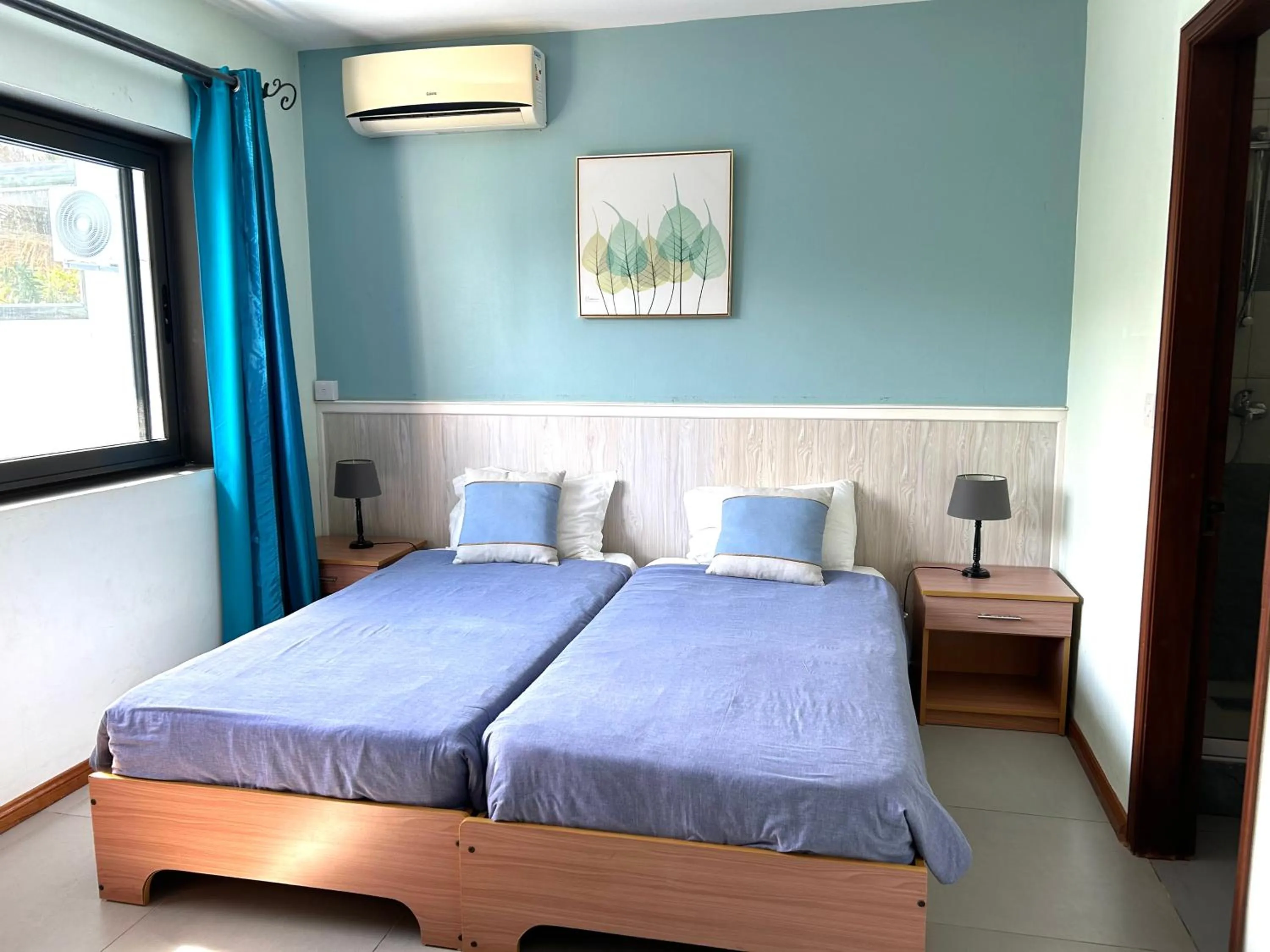 Bed in Blue Beryl Guest House