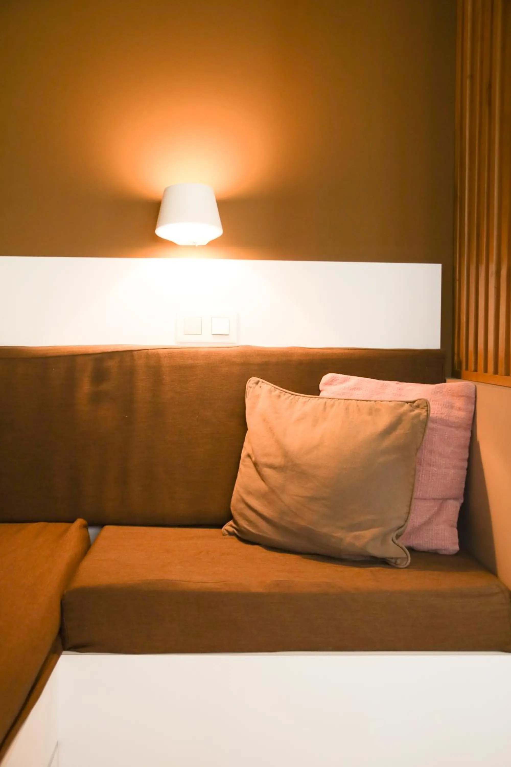 Seating area, Bed in Alfa Inn