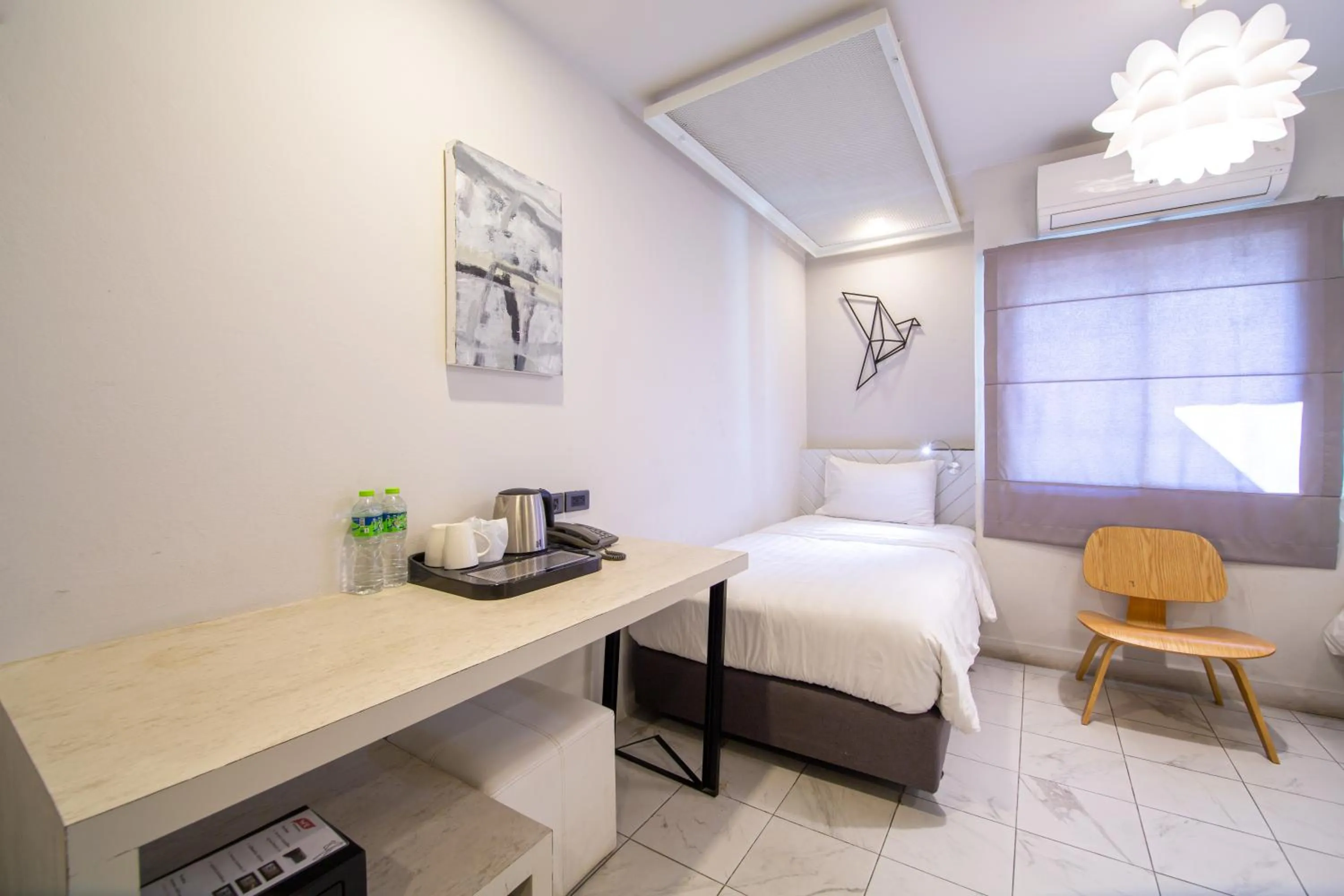 Bed in WE Terminal Hotel