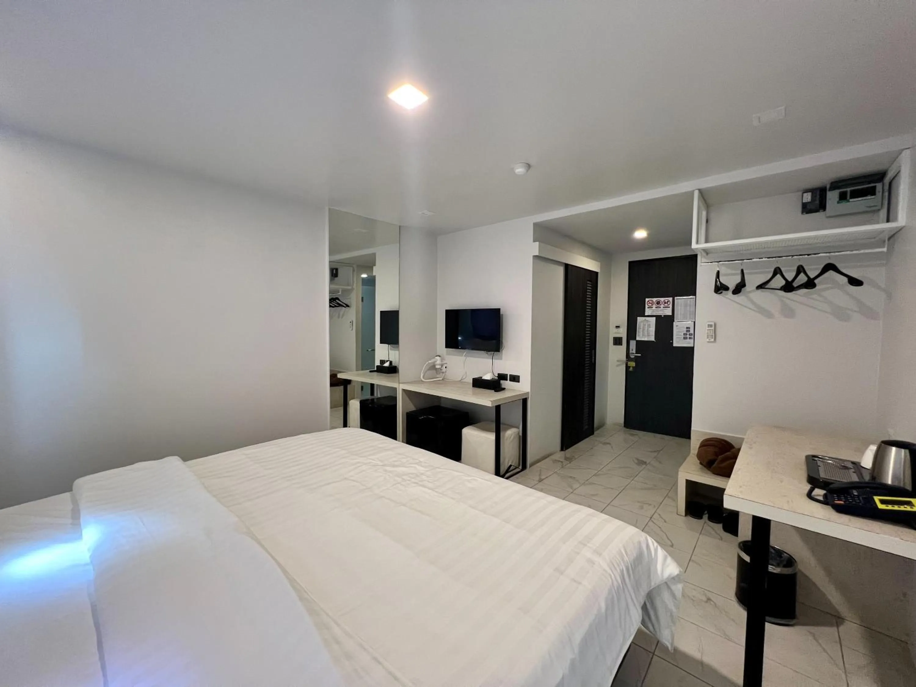 Photo of the whole room, Bed in WE Terminal Hotel