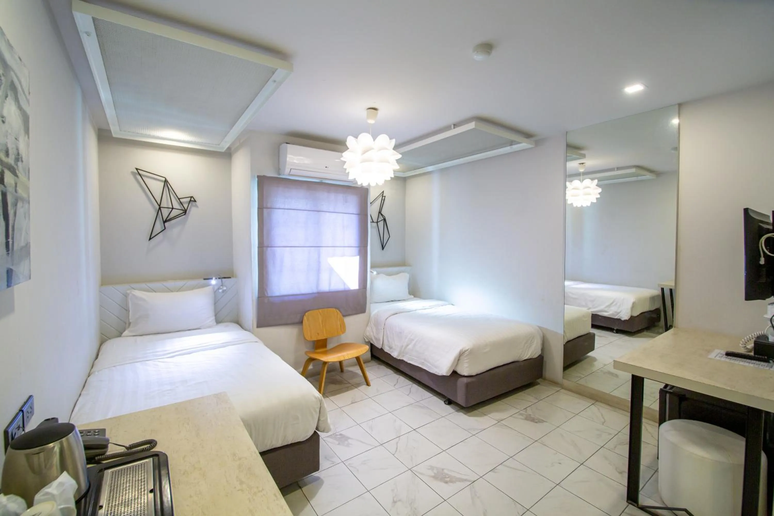 Bed in WE Terminal Hotel