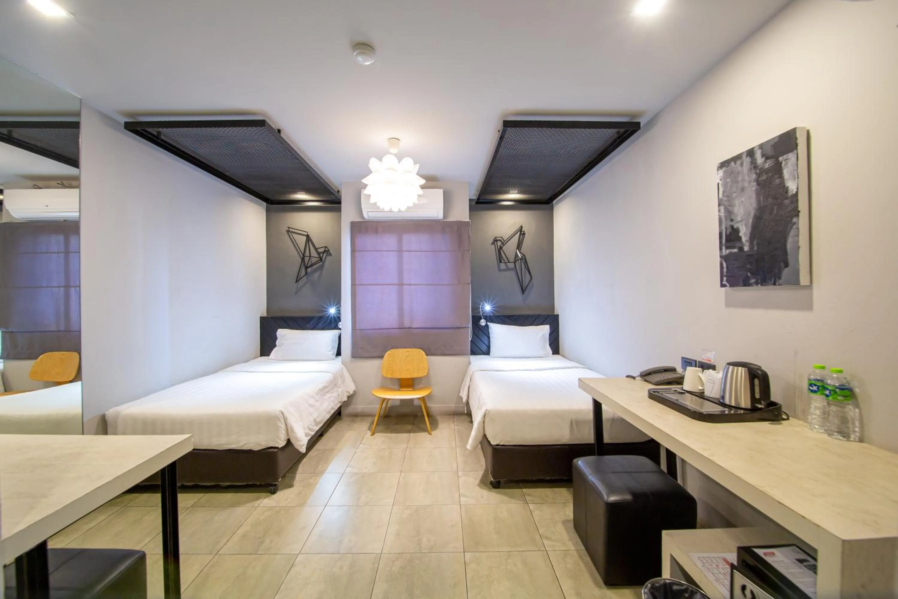 Photo of the whole room, Bed in WE Terminal Hotel