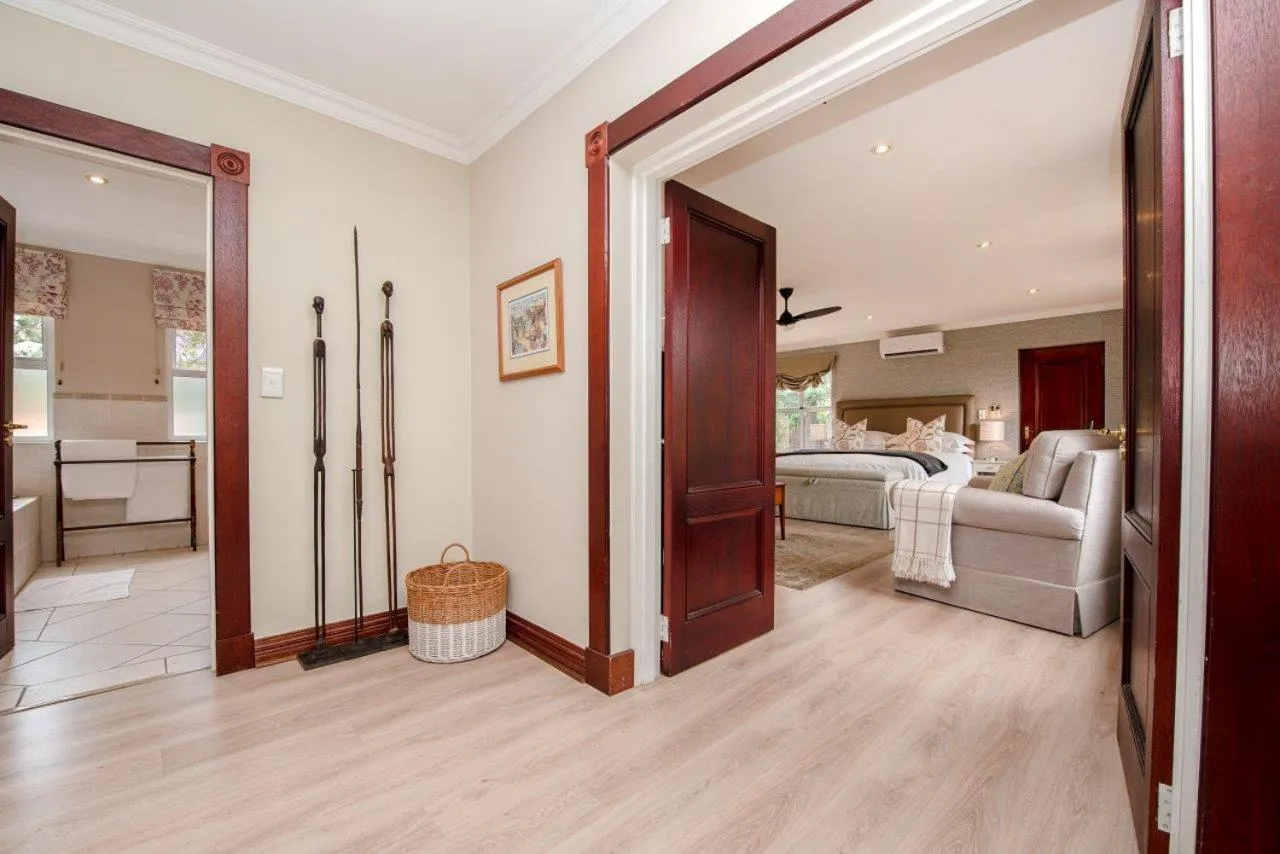 Living room, Bed in Wild Olive Executive Suite