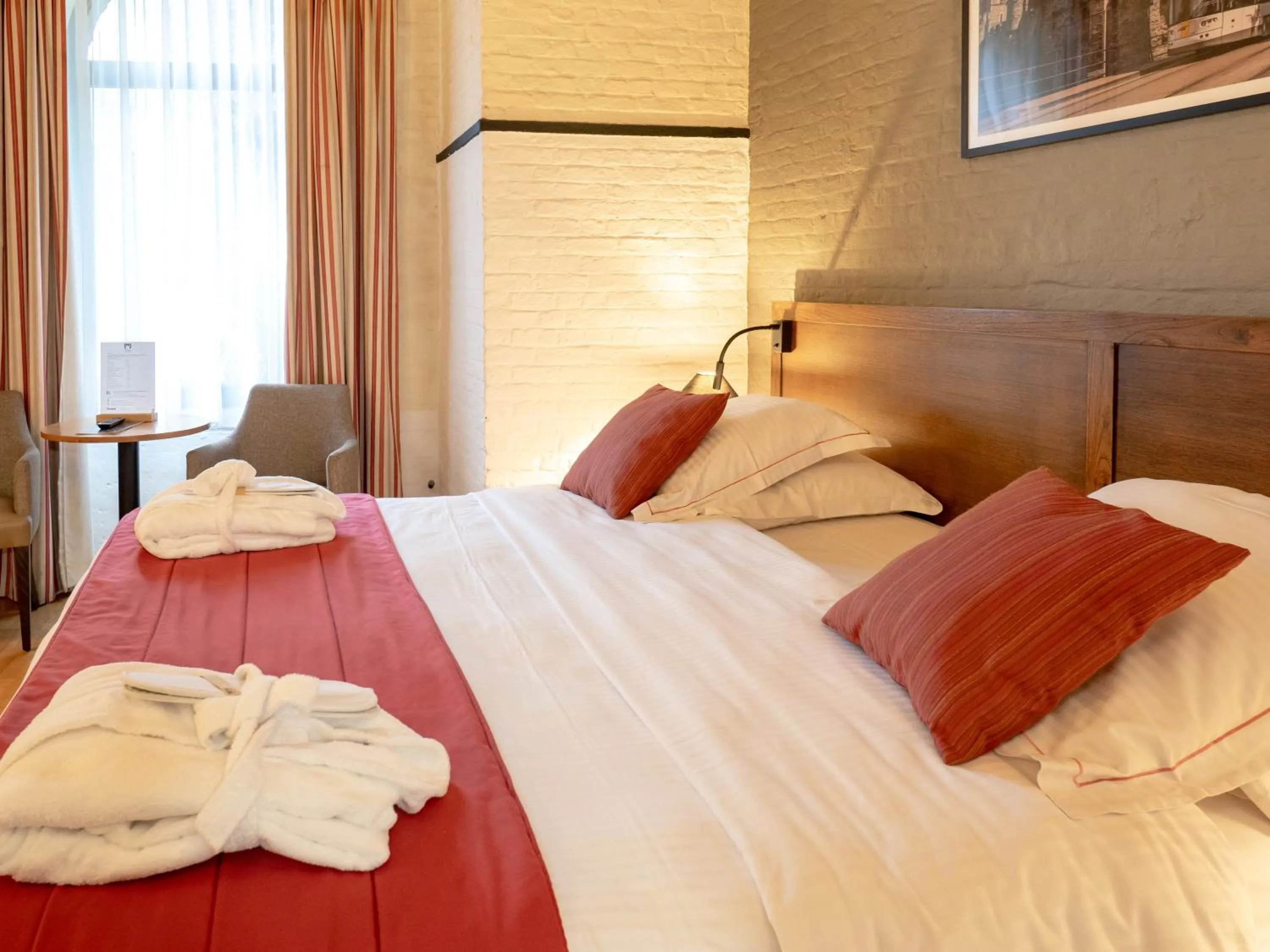 Bed in Ghent River Hotel