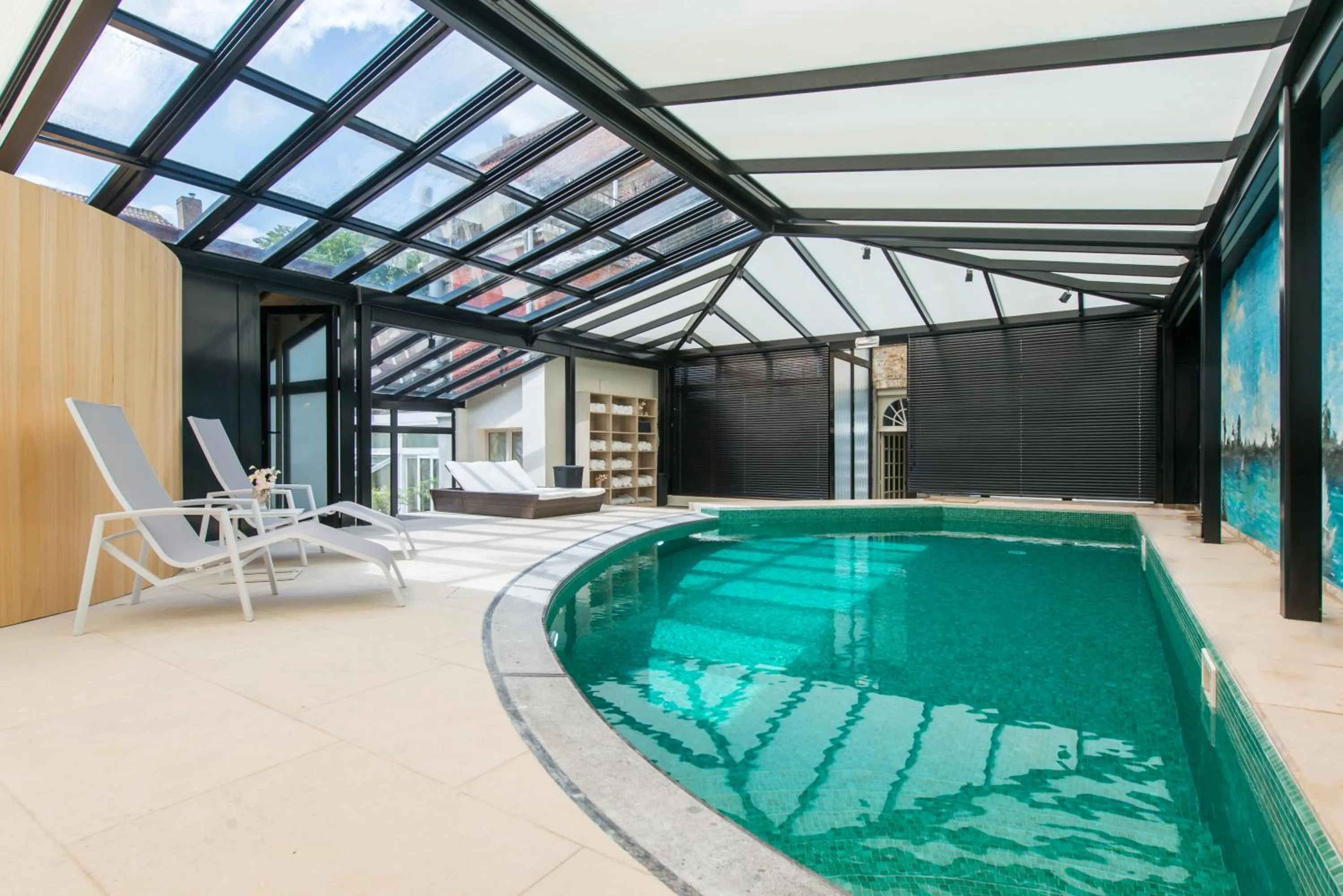 Swimming pool in Boutique Hotel Die Swaene