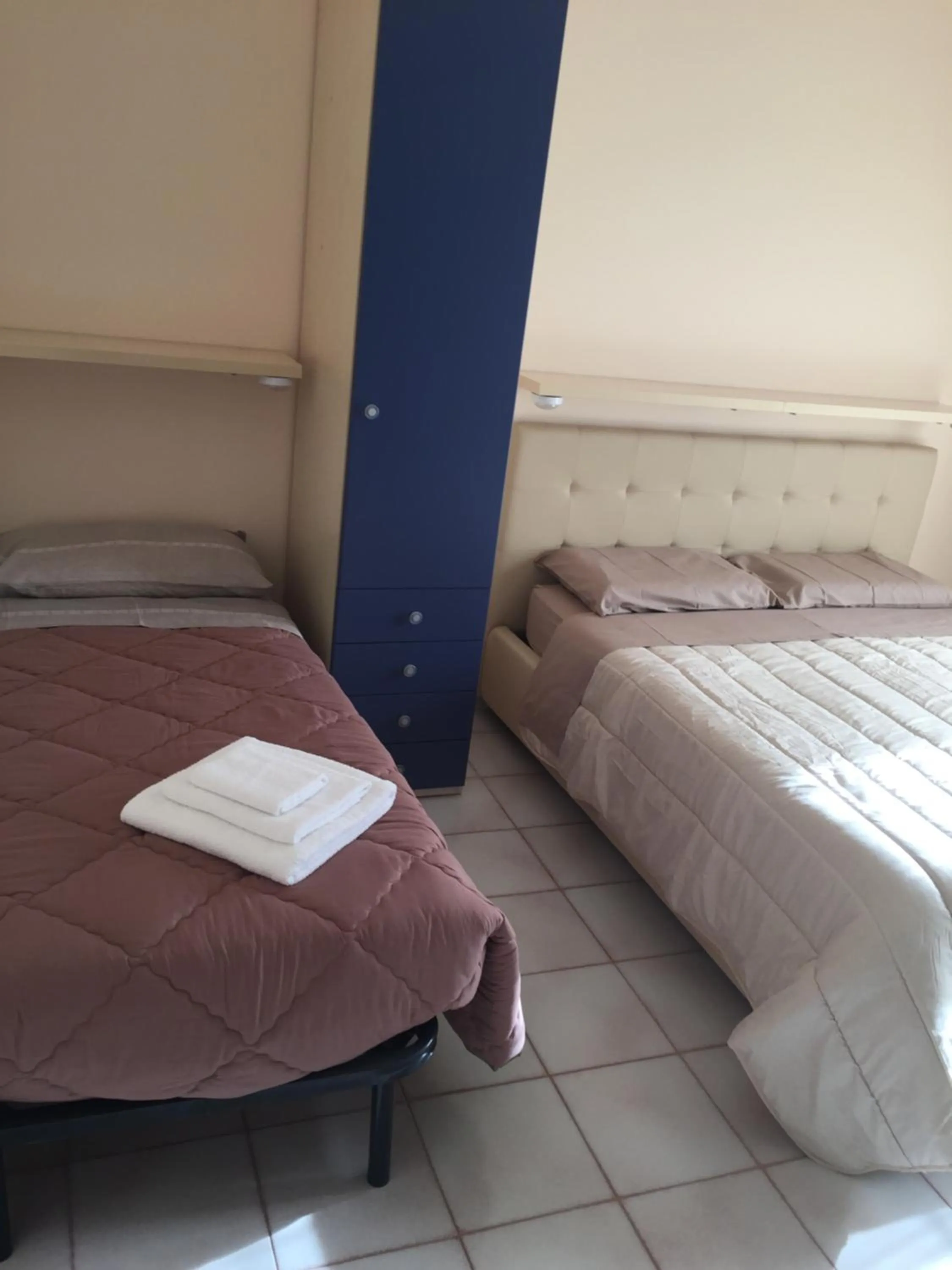 Triple Room with Private Bathroom in B&B Villa dei Fiori
