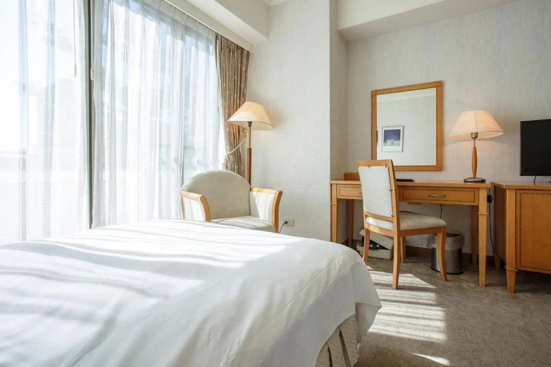 Bed in The Koos Hotel