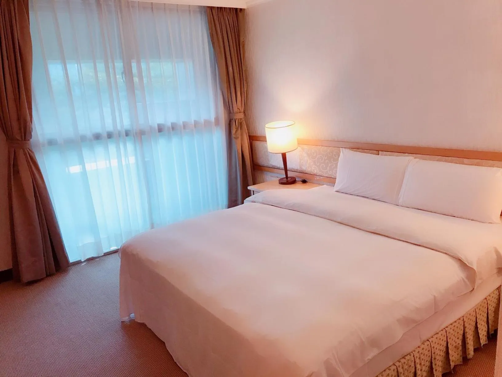 Bed in The Koos Hotel