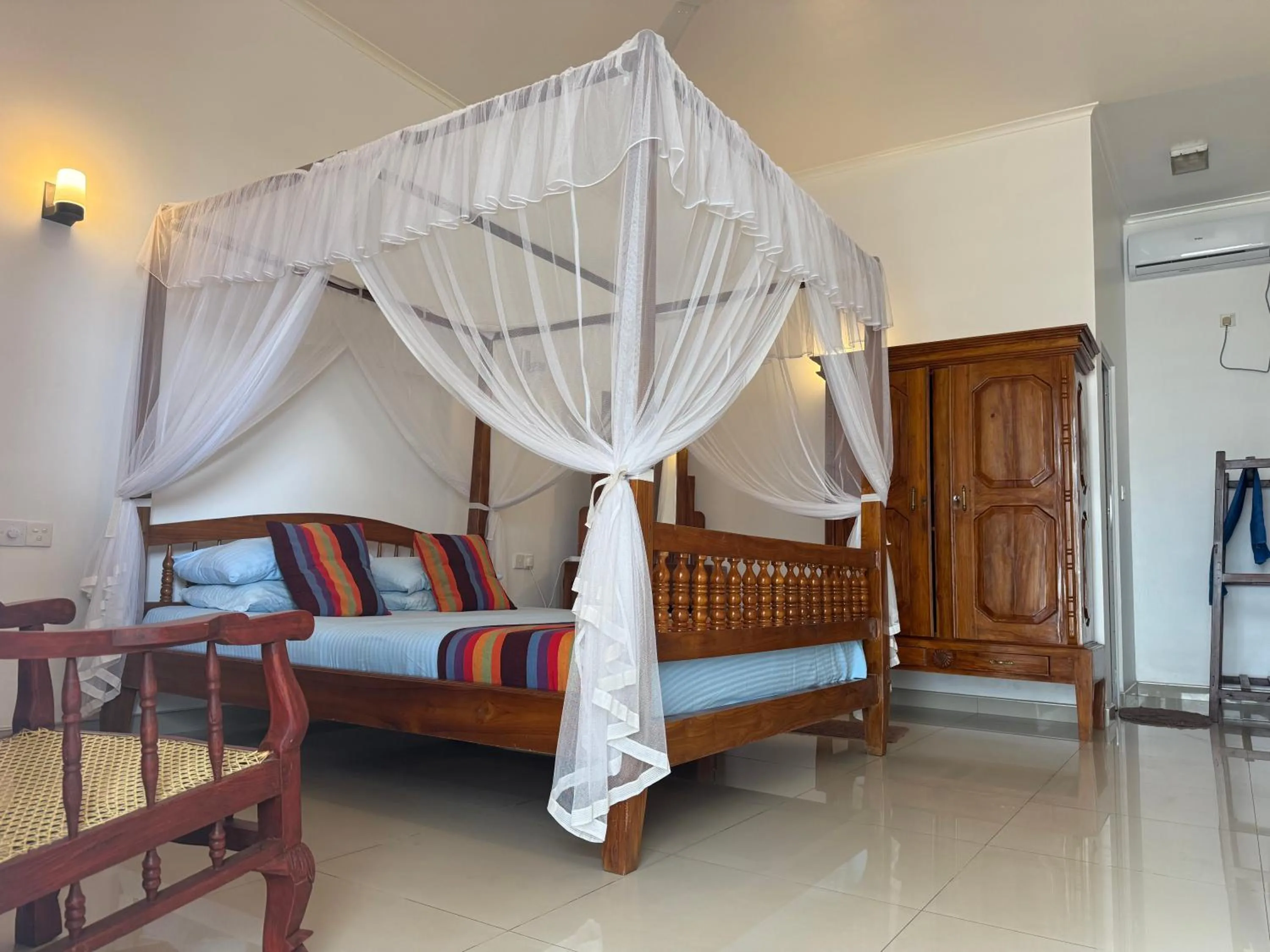Bed in Samaru Beach House