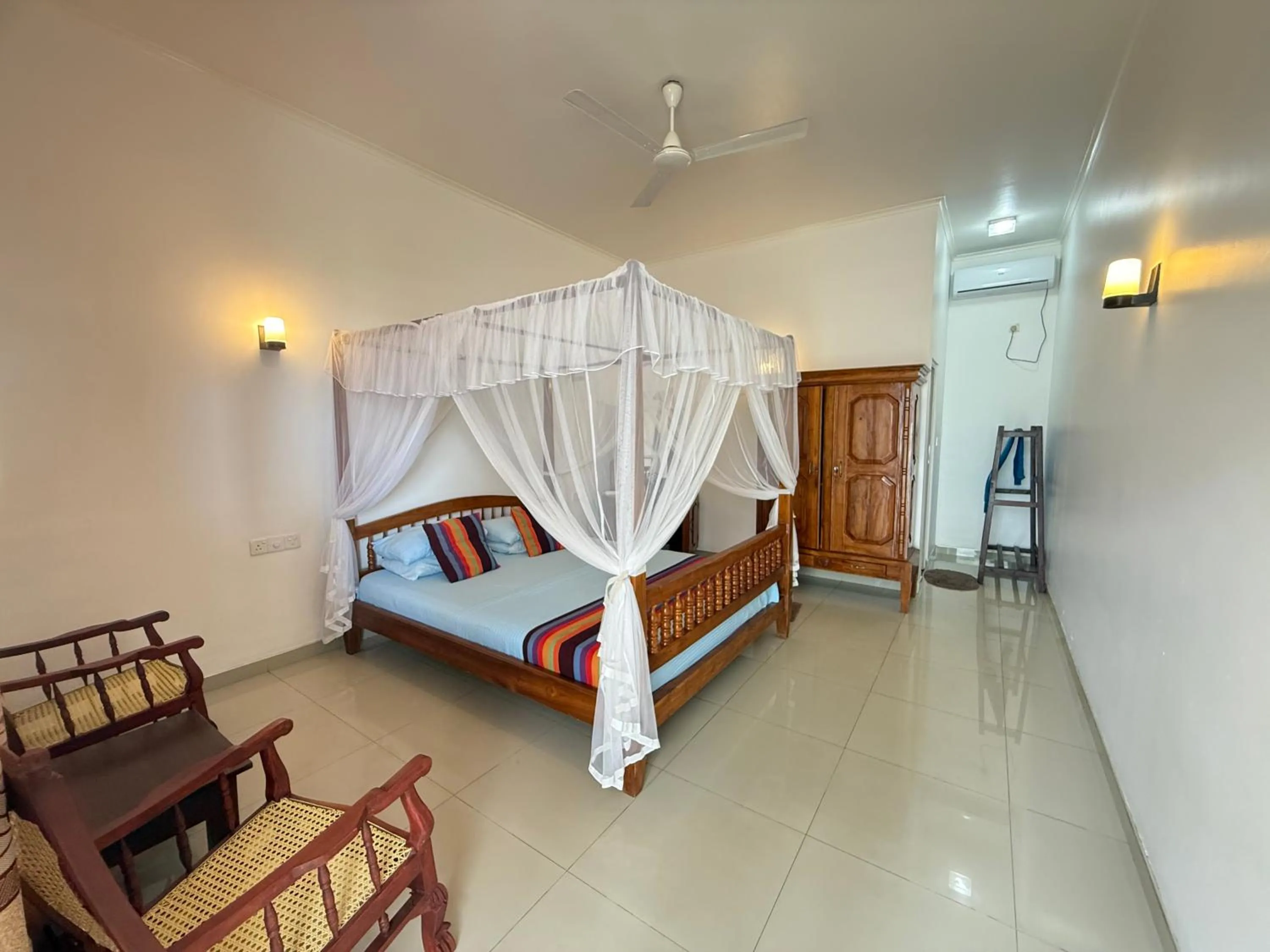 Bed in Samaru Beach House