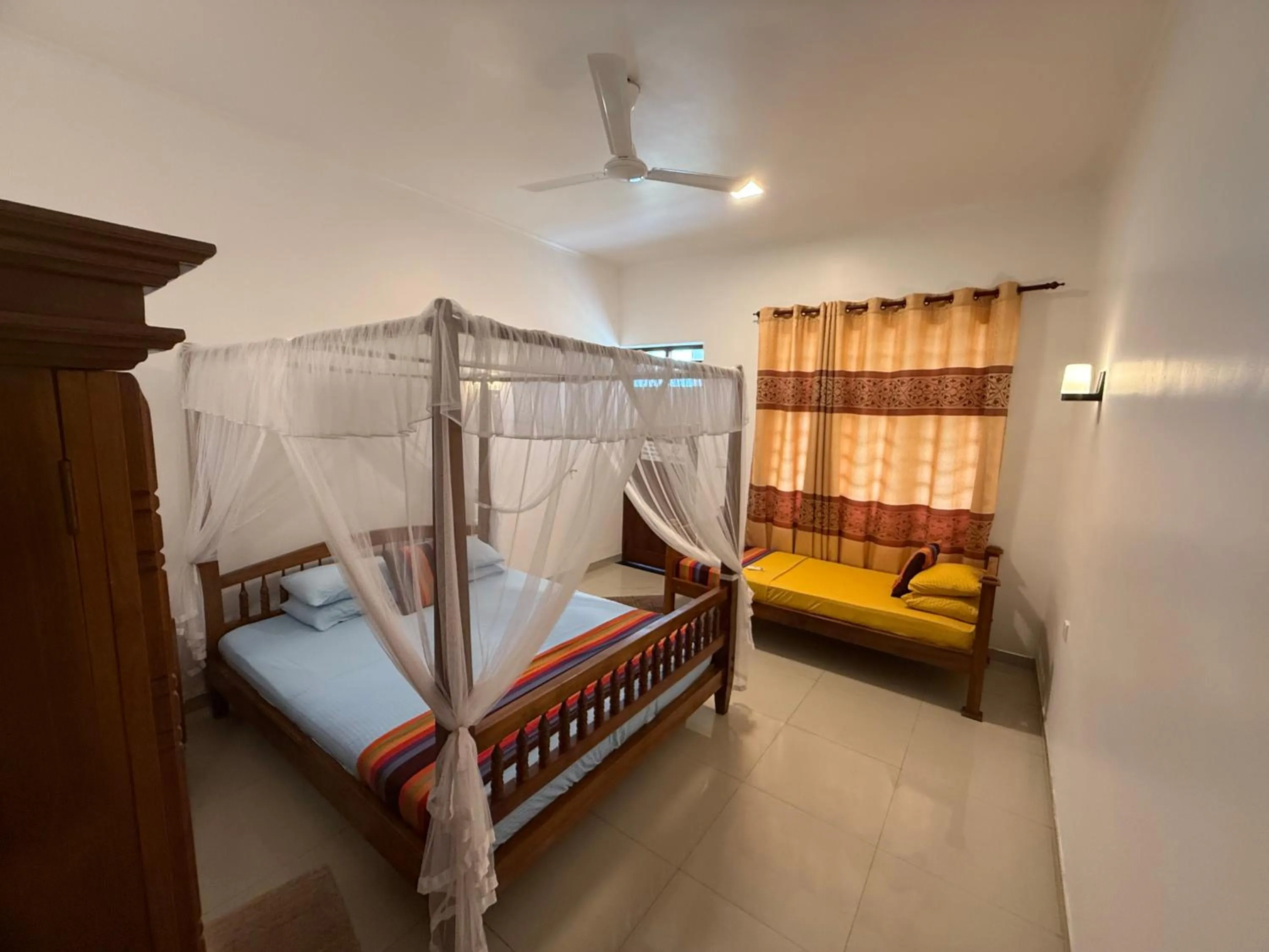 Bed in Samaru Beach House