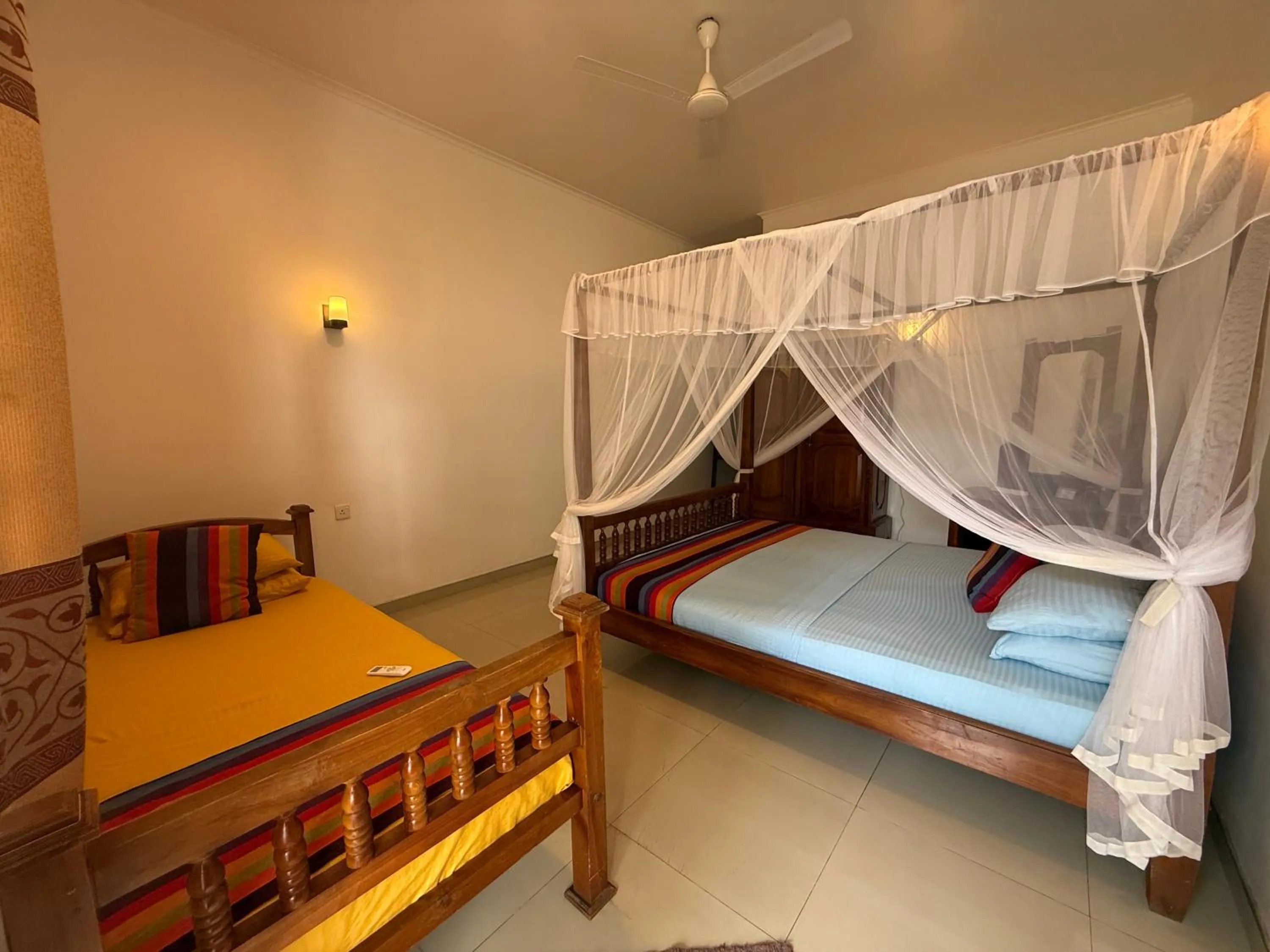 Bed in Samaru Beach House